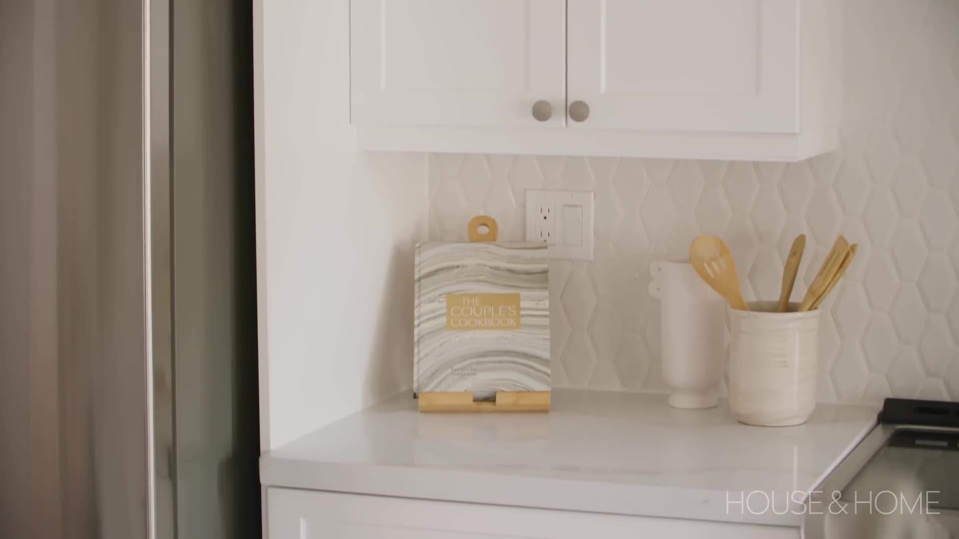 Kitchen with white cabinets and smart appliances