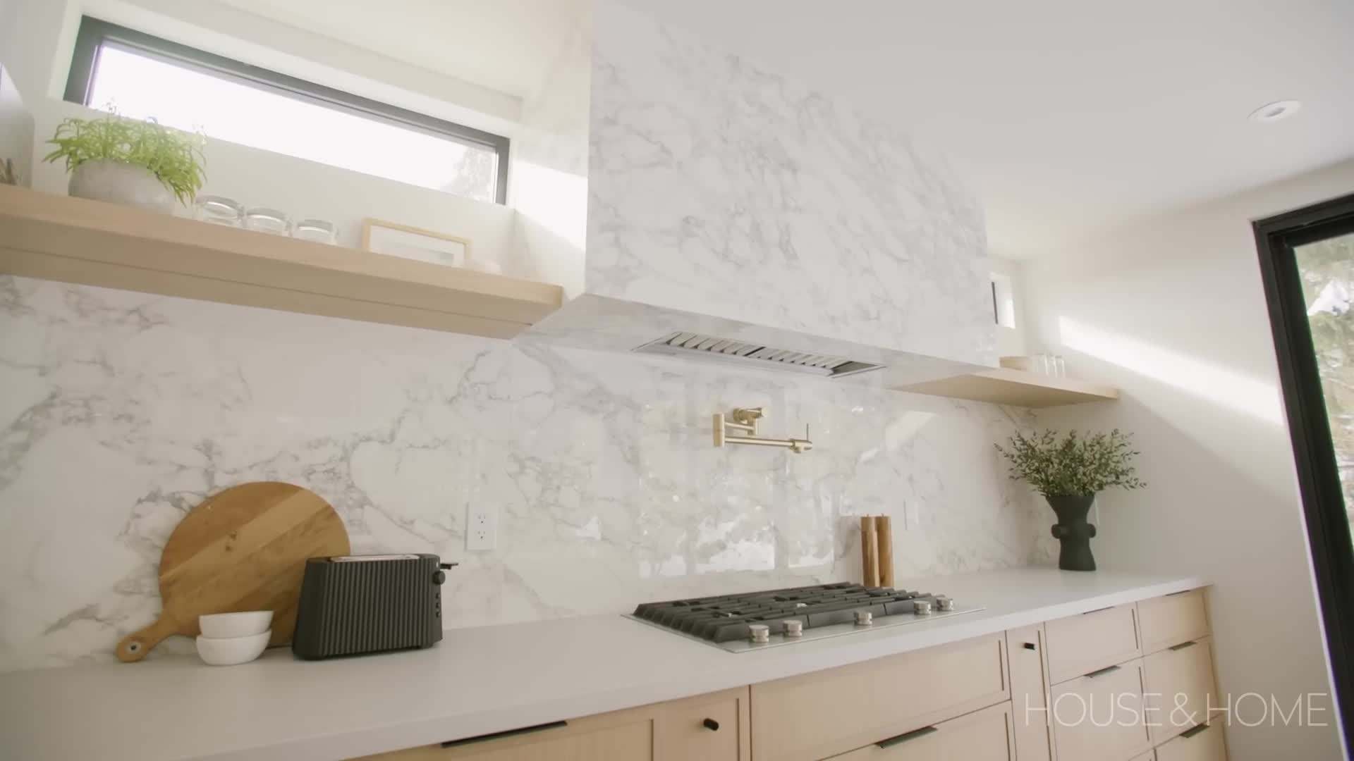 A large indoor plant adds a pop of greenery to the living room