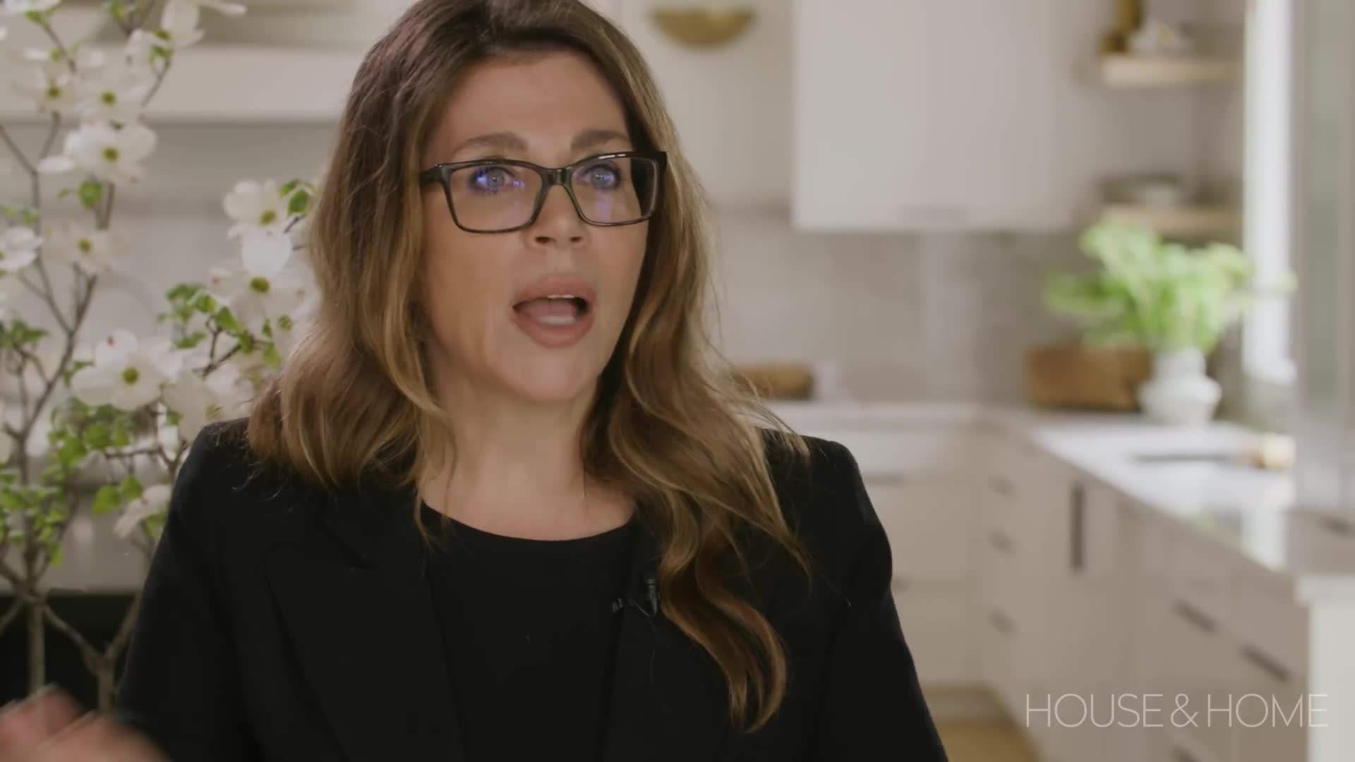 Floor-to-ceiling cabinets and custom-built pantry units maximizing vertical storage space