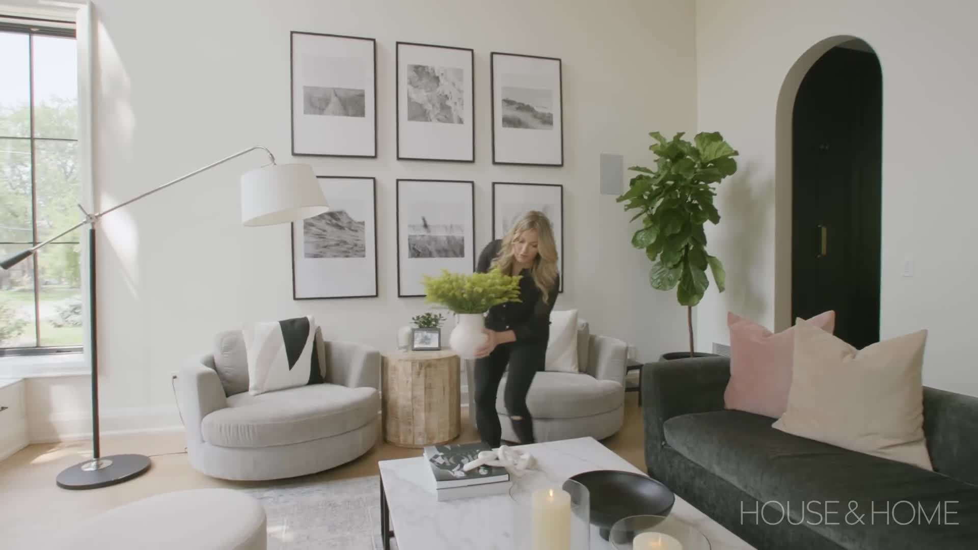 Cozy Seating Area in the Foyer with Vintage Artwork