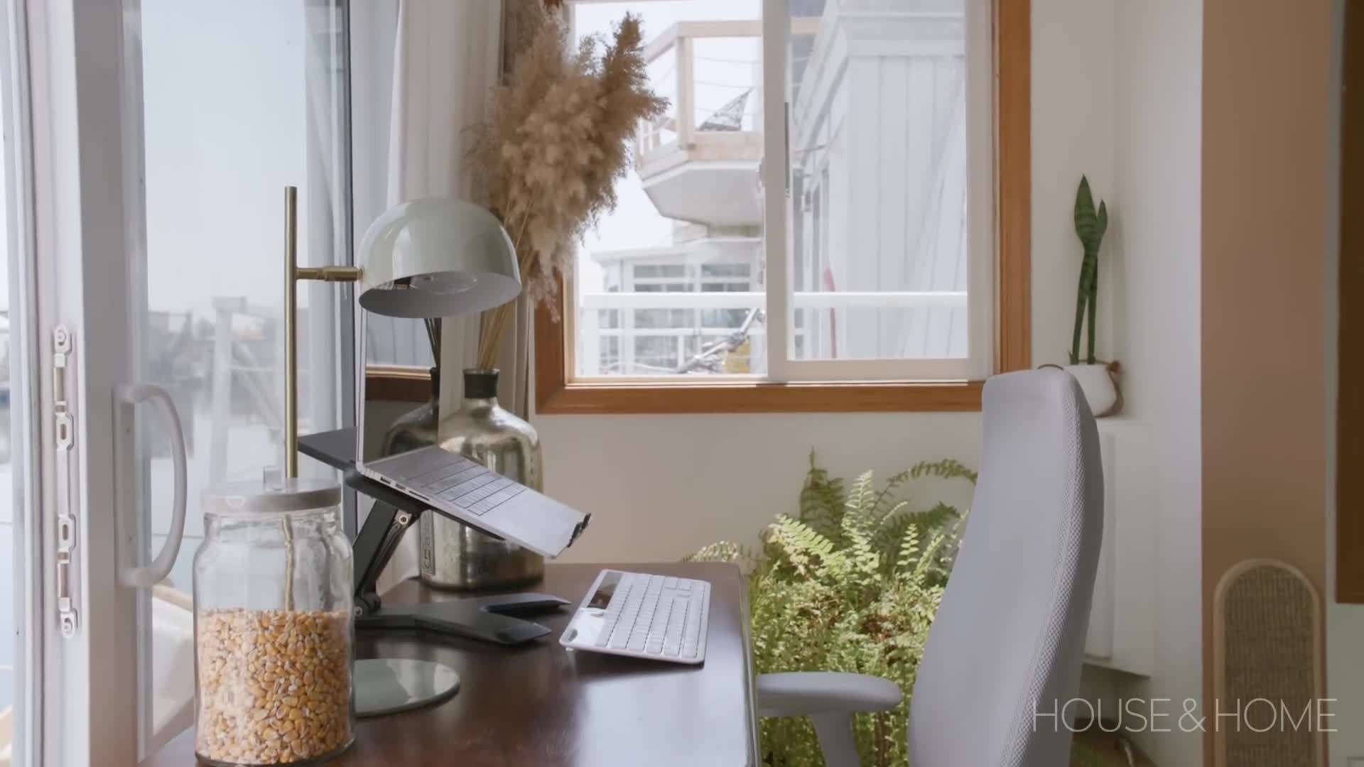 Kate Fincham enjoying the beautiful view from her houseboat