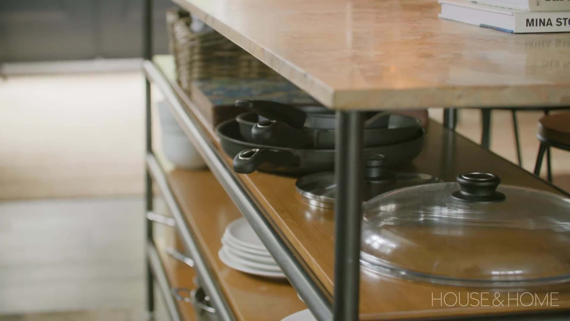 The open-concept design seamlessly connects the kitchen, dining, and living areas