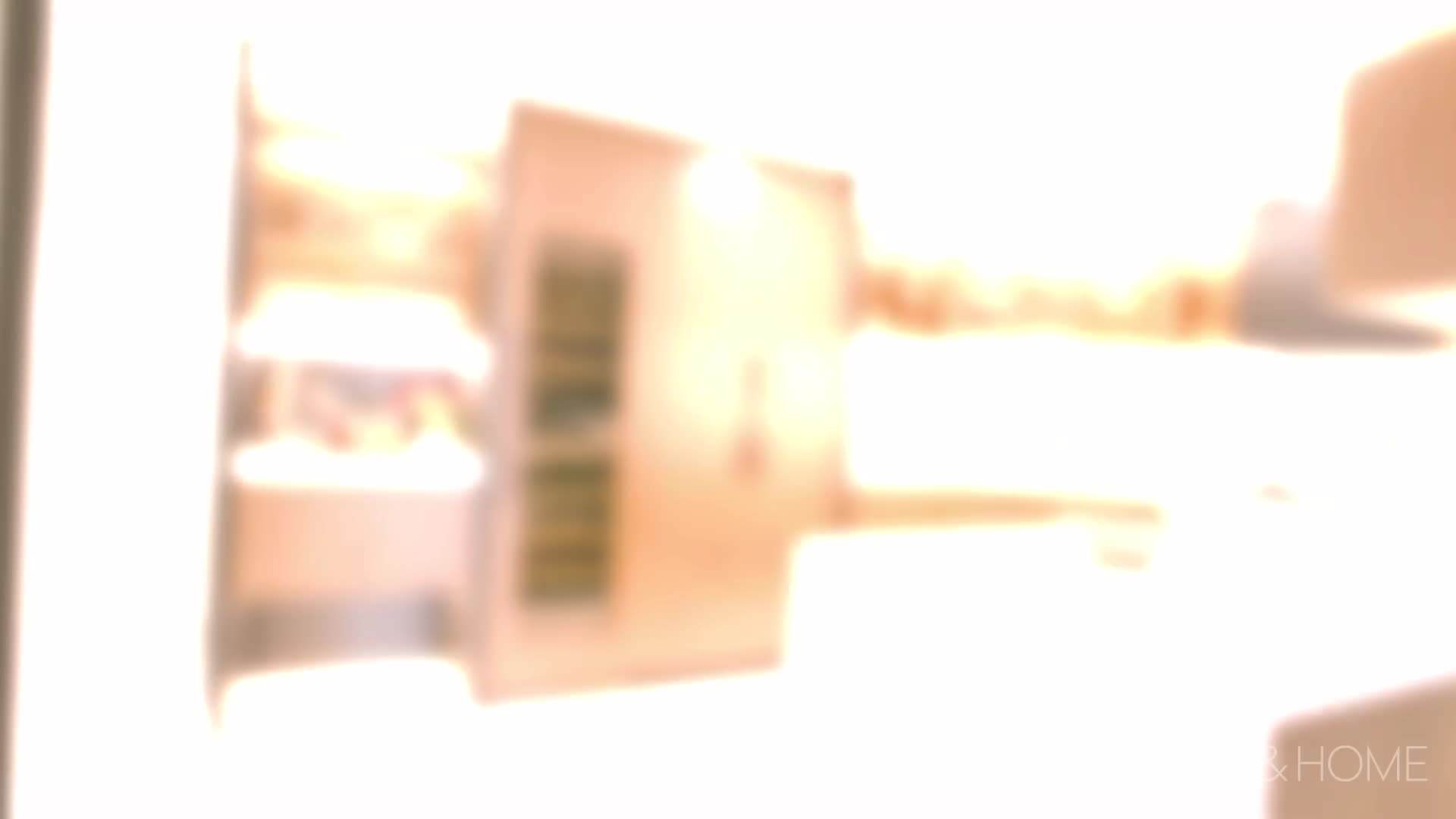 Moody color scheme with velvet upholstery and gold fixtures