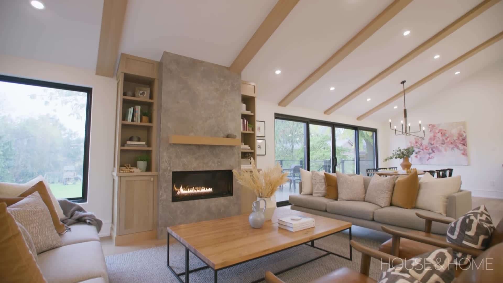 An open-concept living area with large windows and natural light