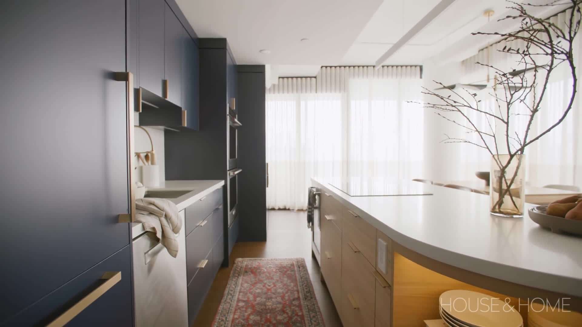 A cozy living room with warm neutral tones and layered textures