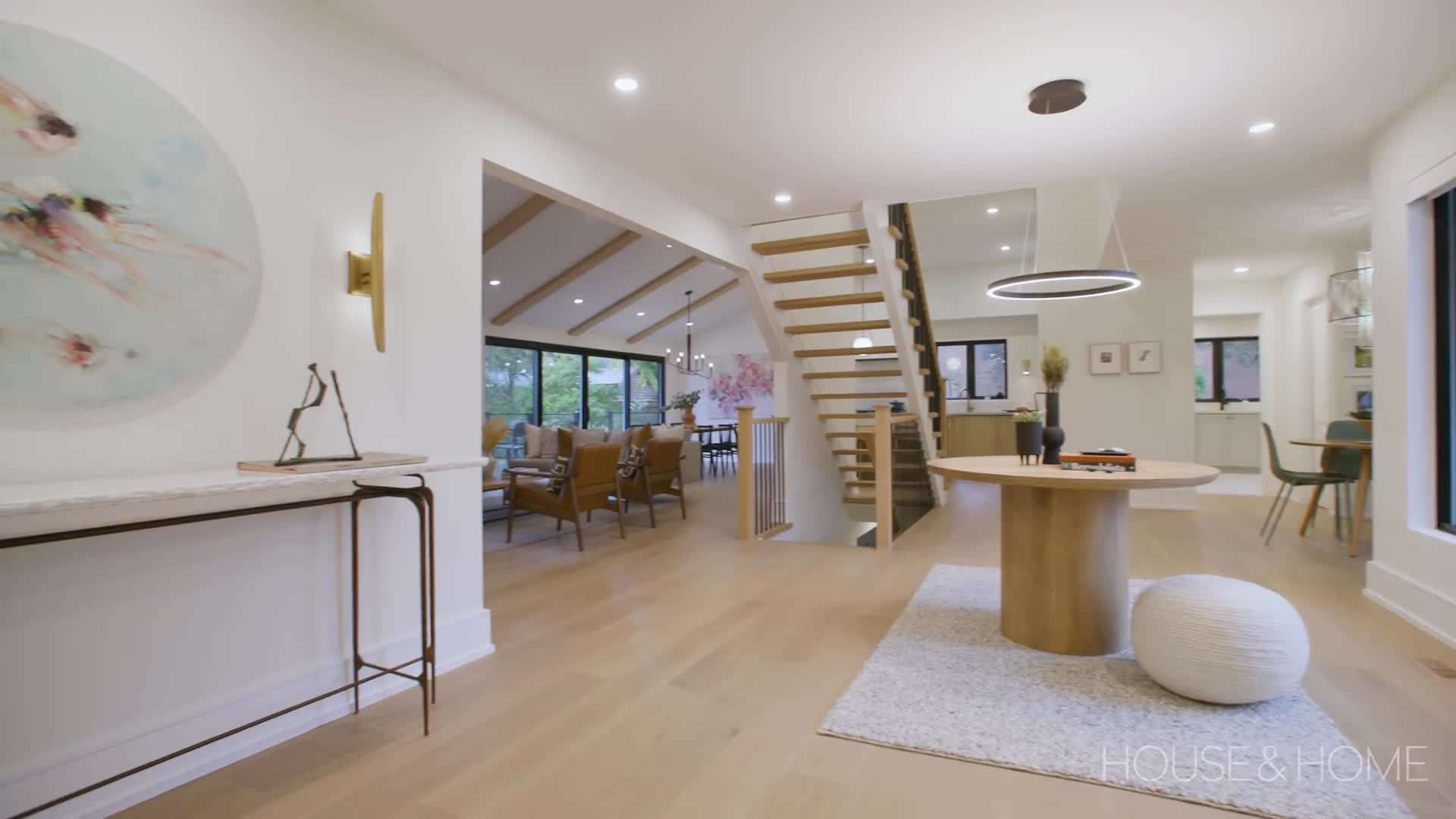 The transformation of the closed-off foyer into a bright and welcoming space