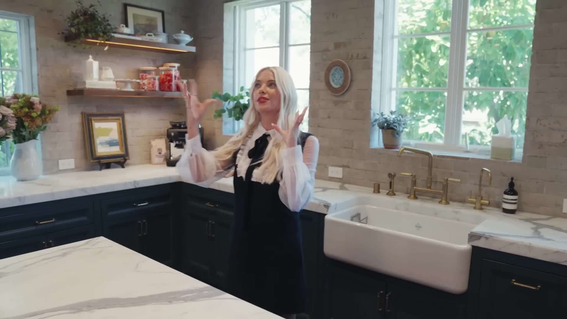 Colorful artwork and a statement mirror in the entryway