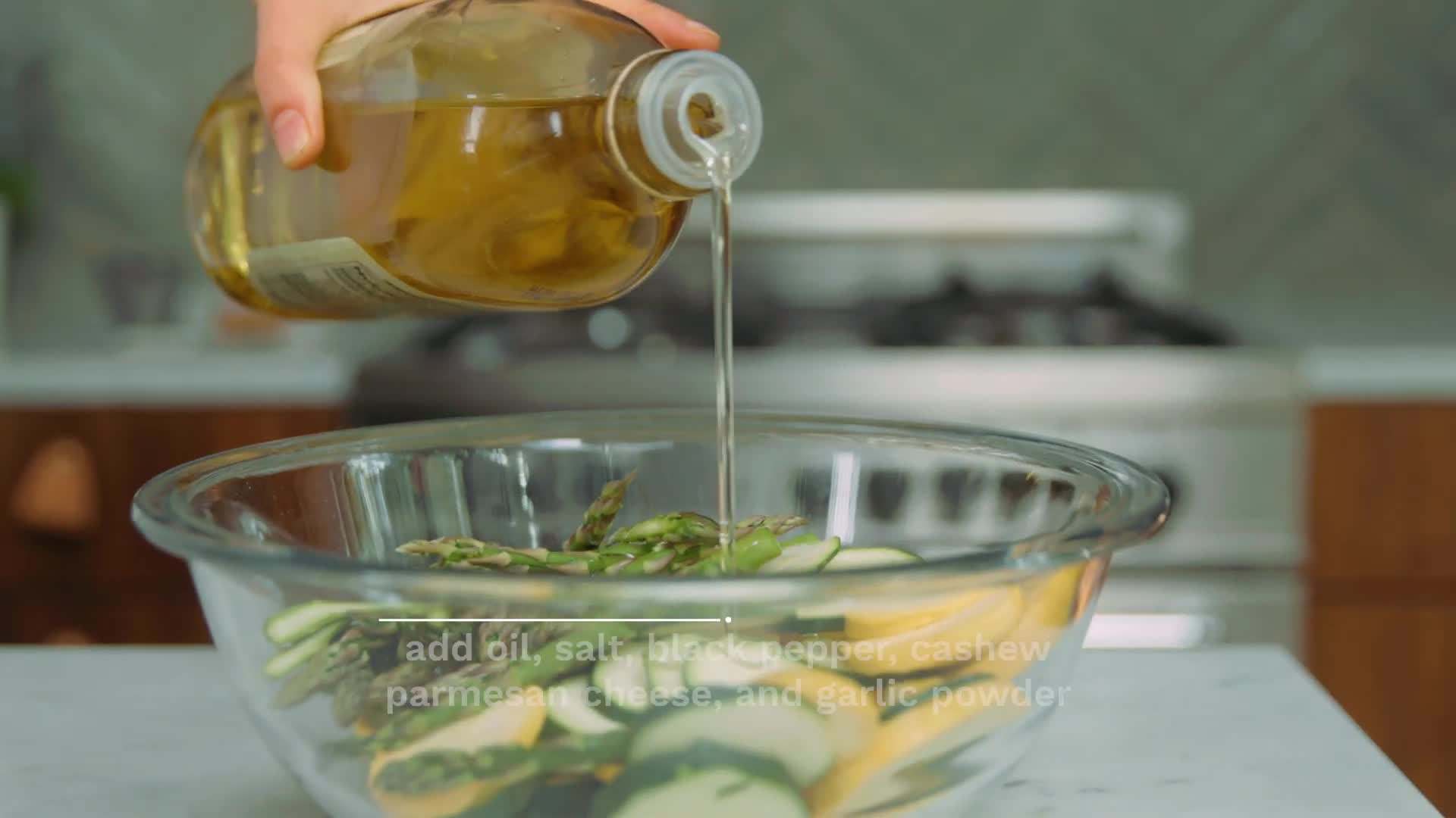 Cashew parmesan cheese sprinkled on top of pizza