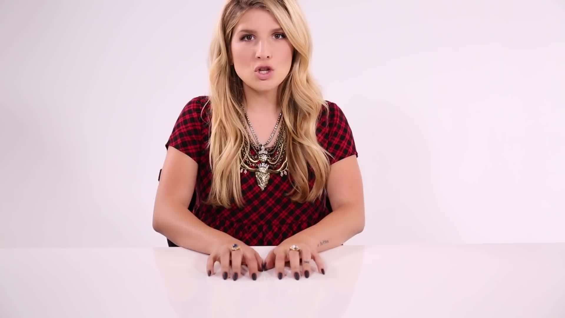 Metal studs and plain sweater