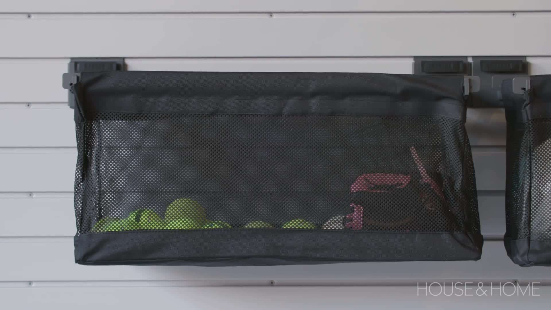 An organized garage with labeled storage bins for different categories of items