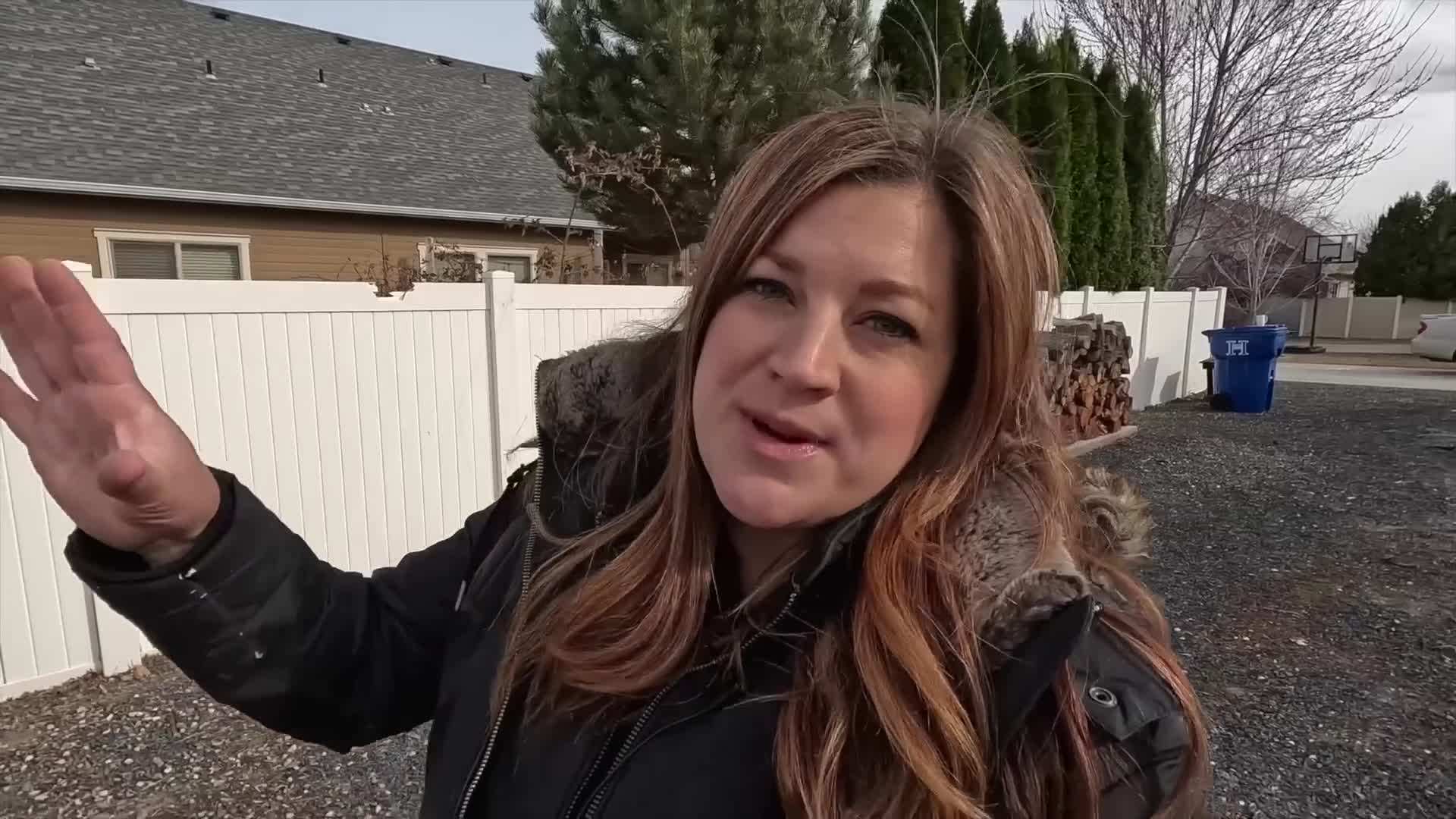 Organized Greenhouse with Storage Bins