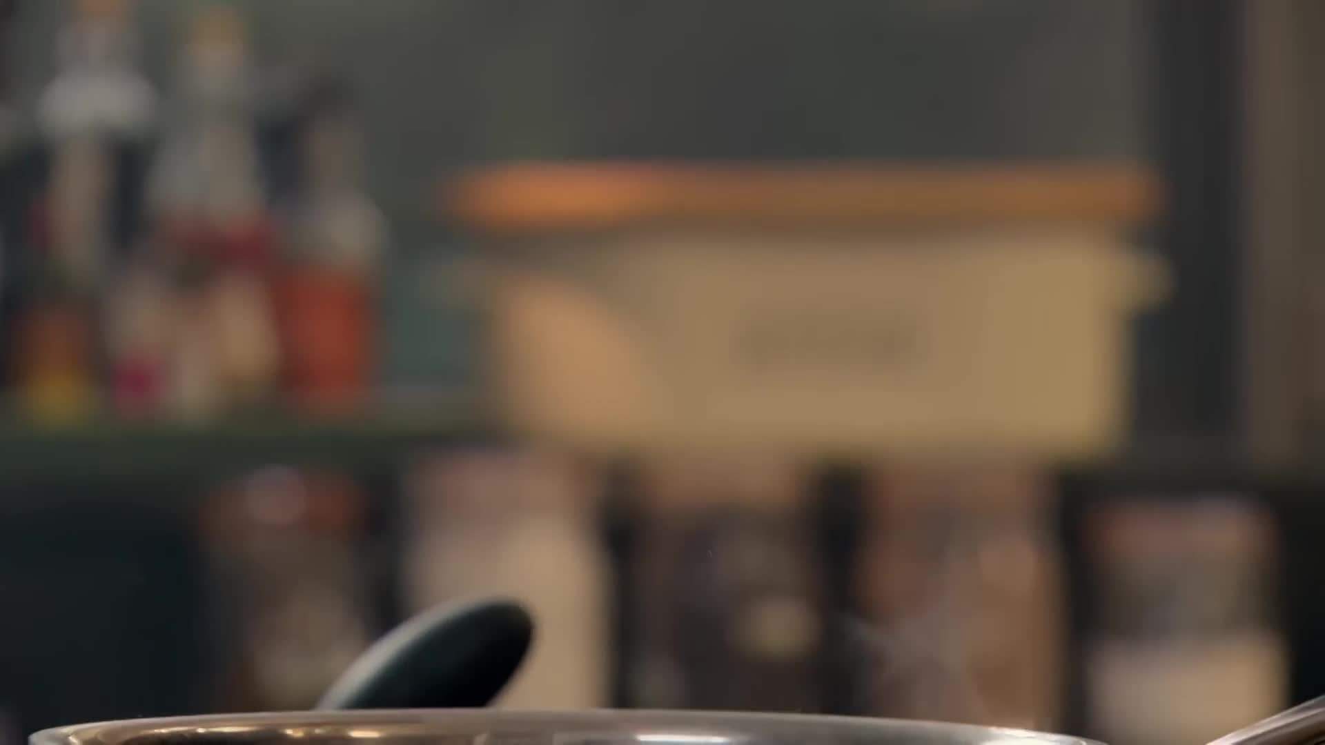 Cooking bacon and cracking eggs