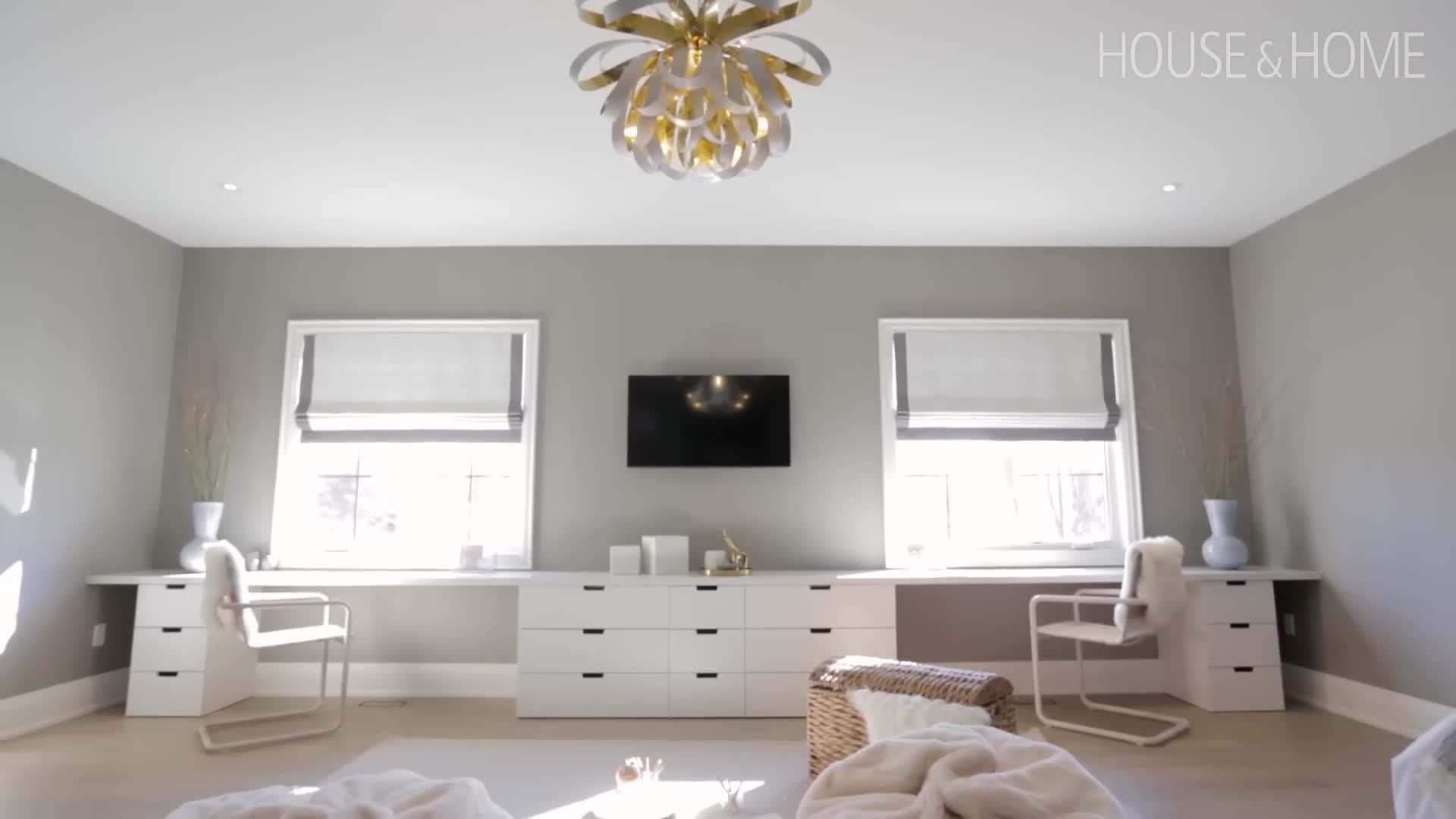 Elegant and spacious master bedroom with a panoramic view of the city