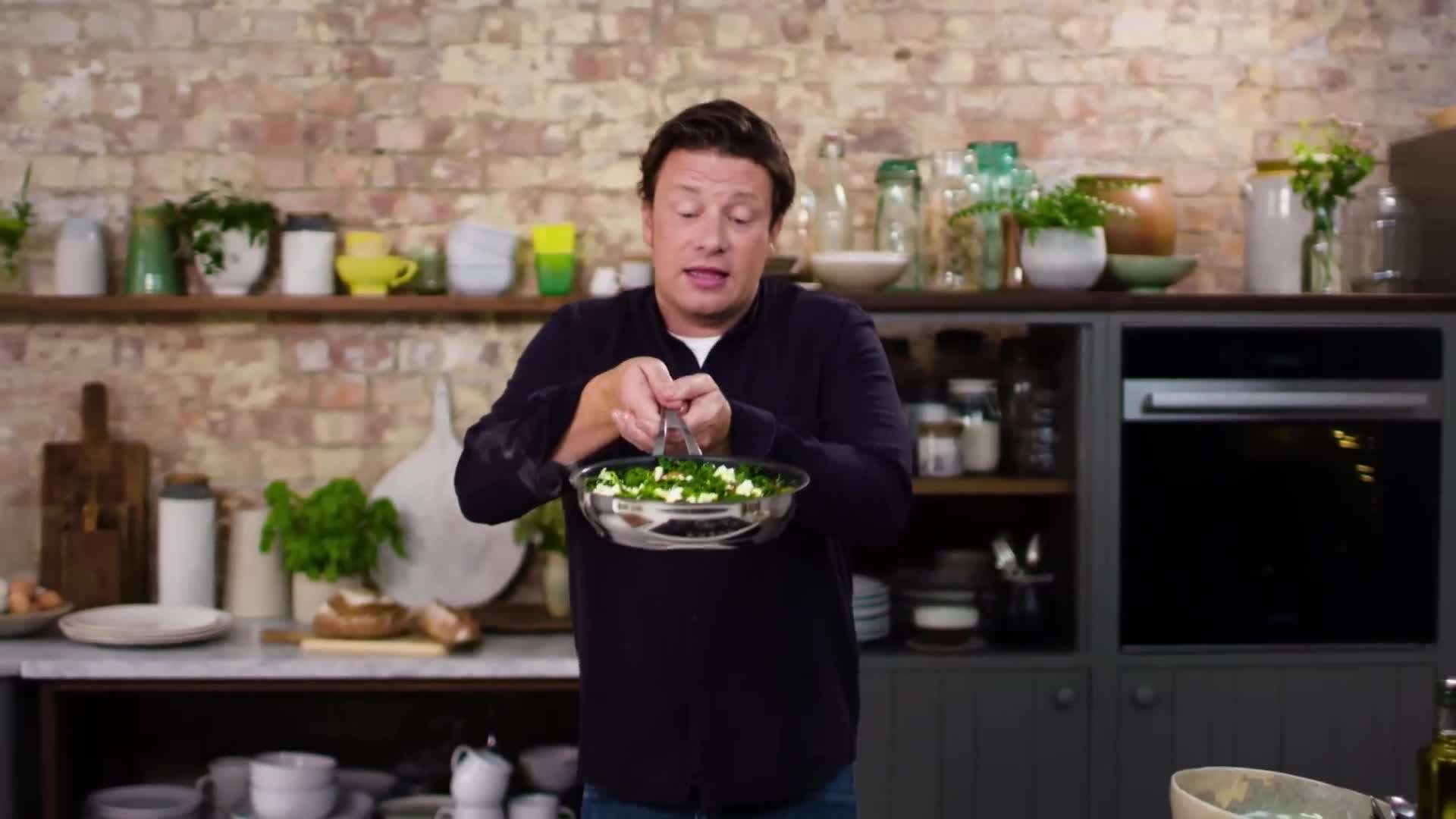 Whisking together the eggs and milk for the frittata mixture