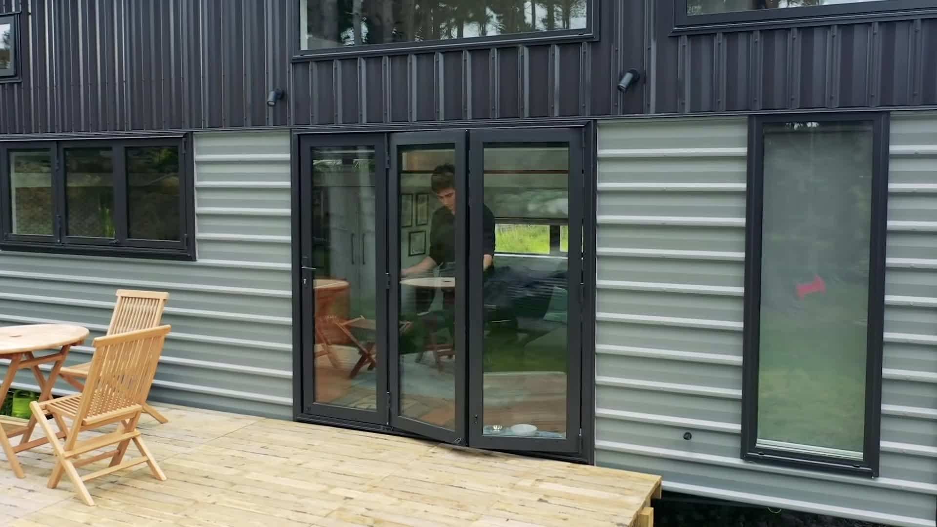 Interior of the tiny home showcasing the open-concept living area