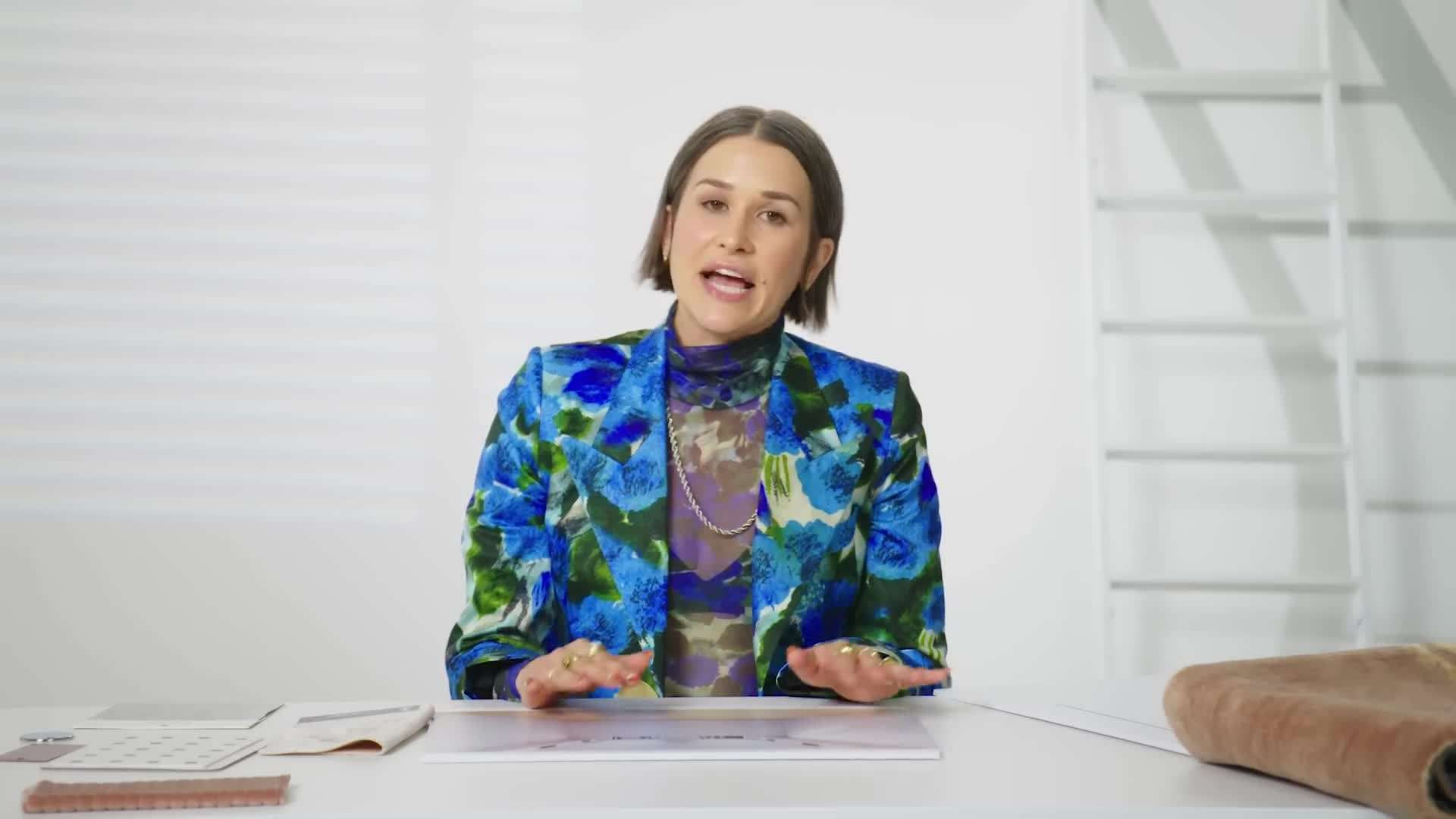 A central bar area with a geometric tile backsplash and marble countertop