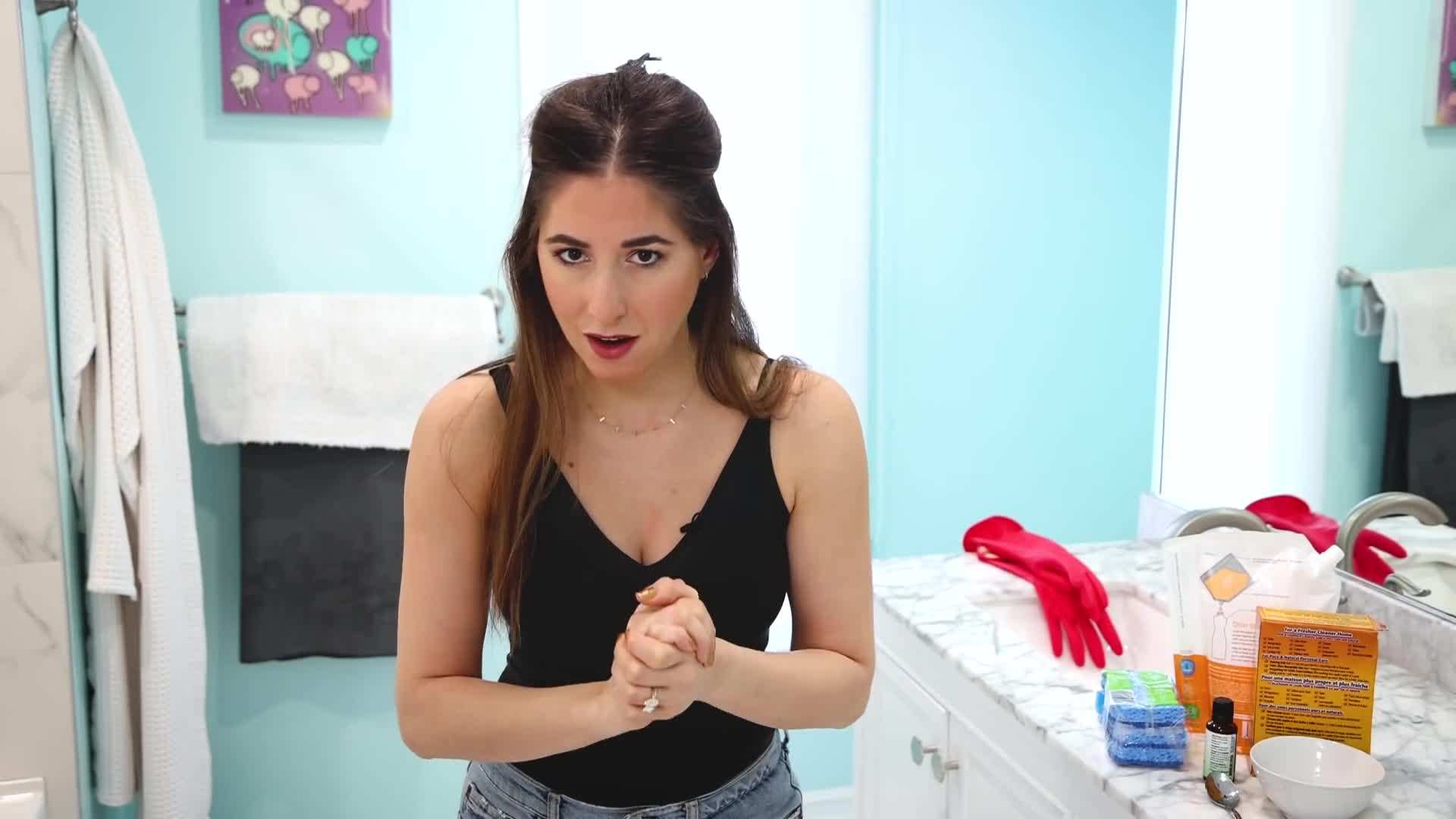 A dirty bathtub covered in soap scum and stains