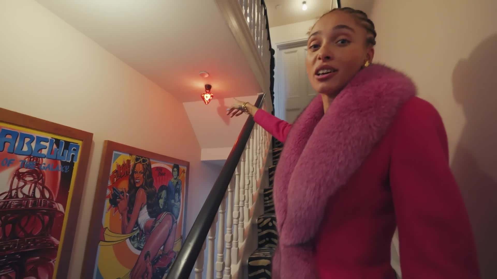 The striking juxtaposition of the rustic farmhouse table and modern chairs in Adwoa's dining room