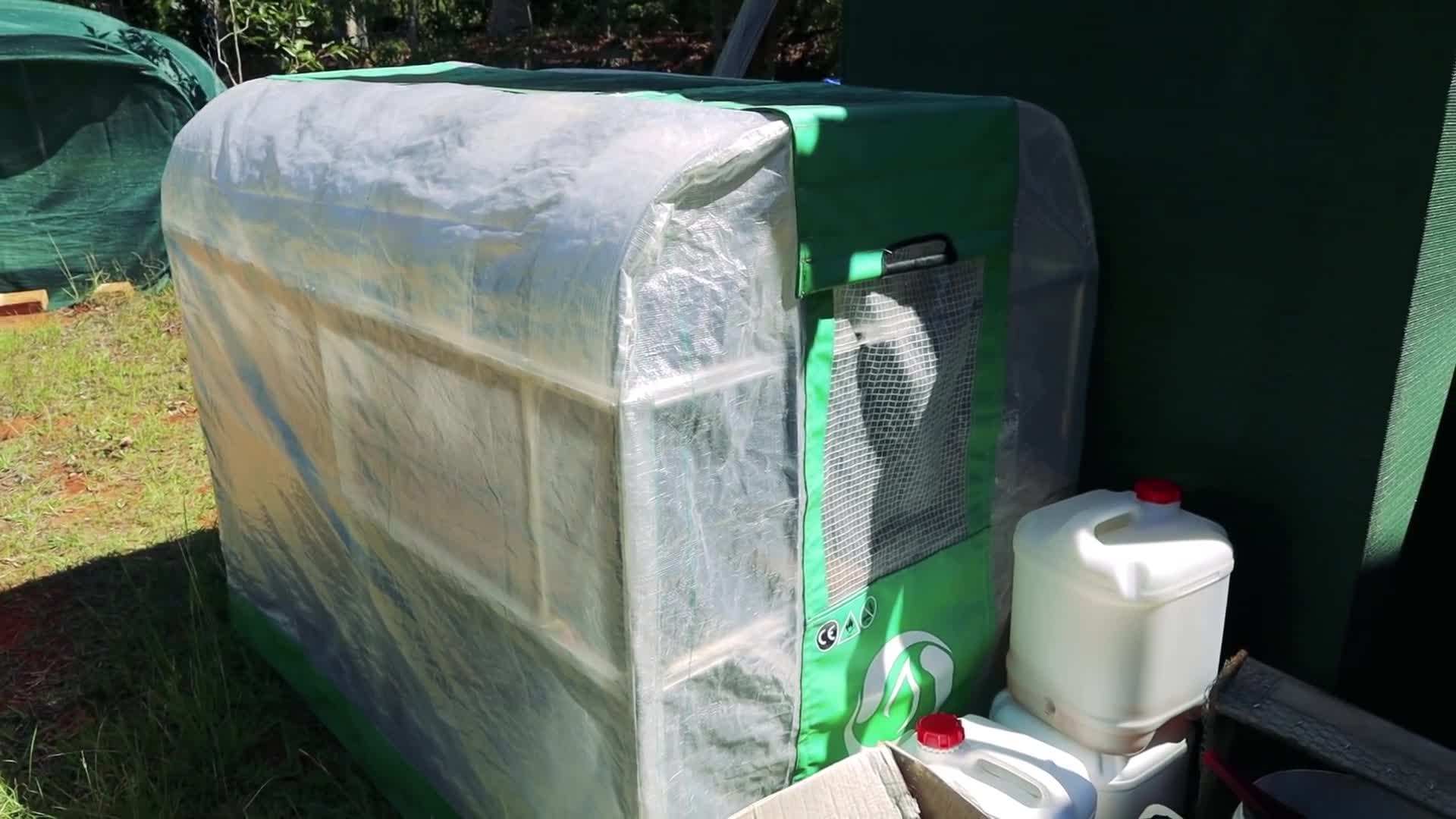 The tiny house's design maximizes natural light with large windows and skylights