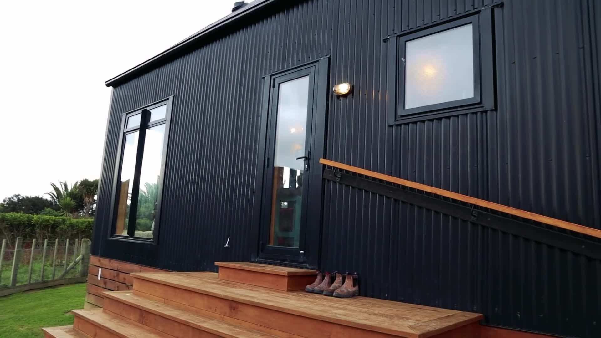 The cabin's solar panels and rainwater harvesting system