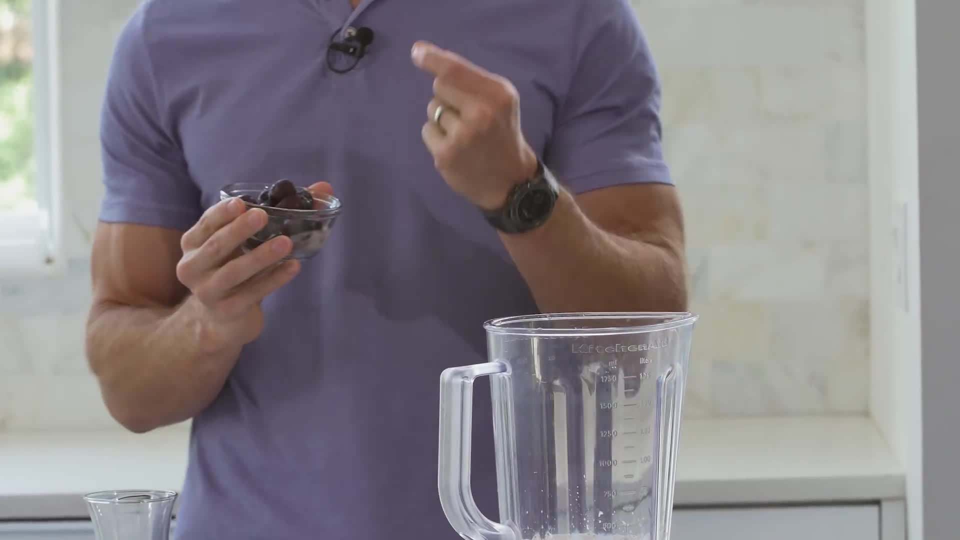 A colorful blend of berries, leafy greens, and nuts adds a visually appealing touch to your superfood smoothie.