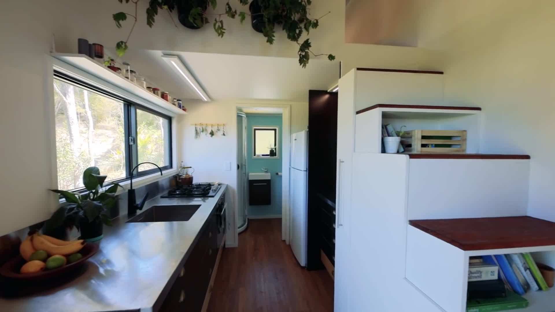 Stef working in her home office area, enjoying the freedom of remote work