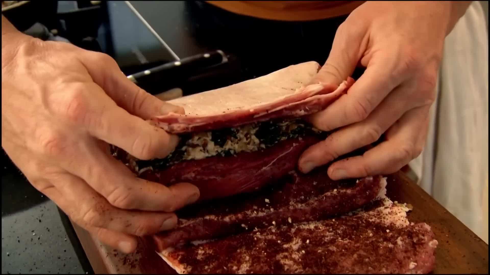 Coating the roast with the flavorful seasoning