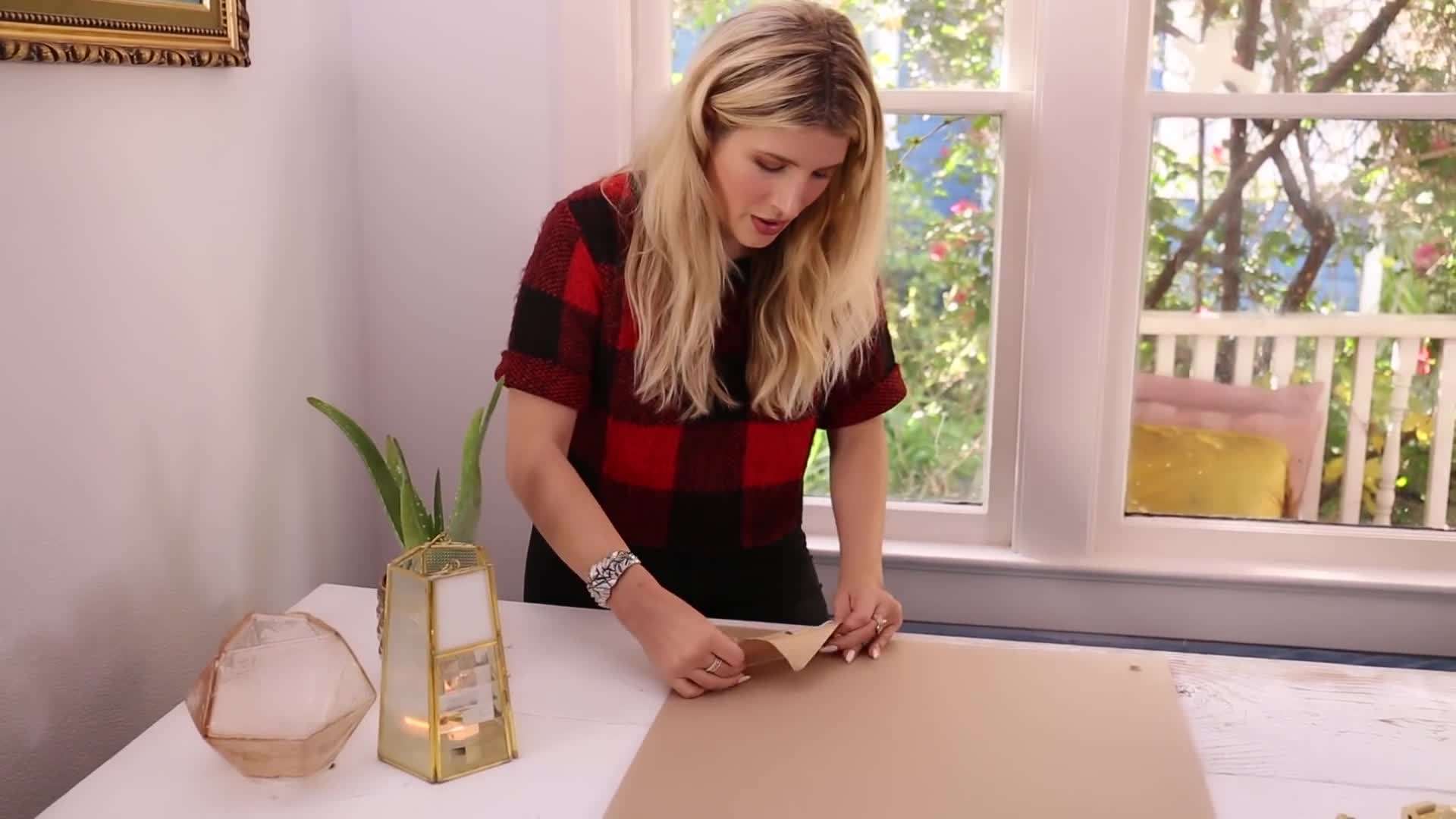 Applying dry erase paint on the back of the acrylic sheet