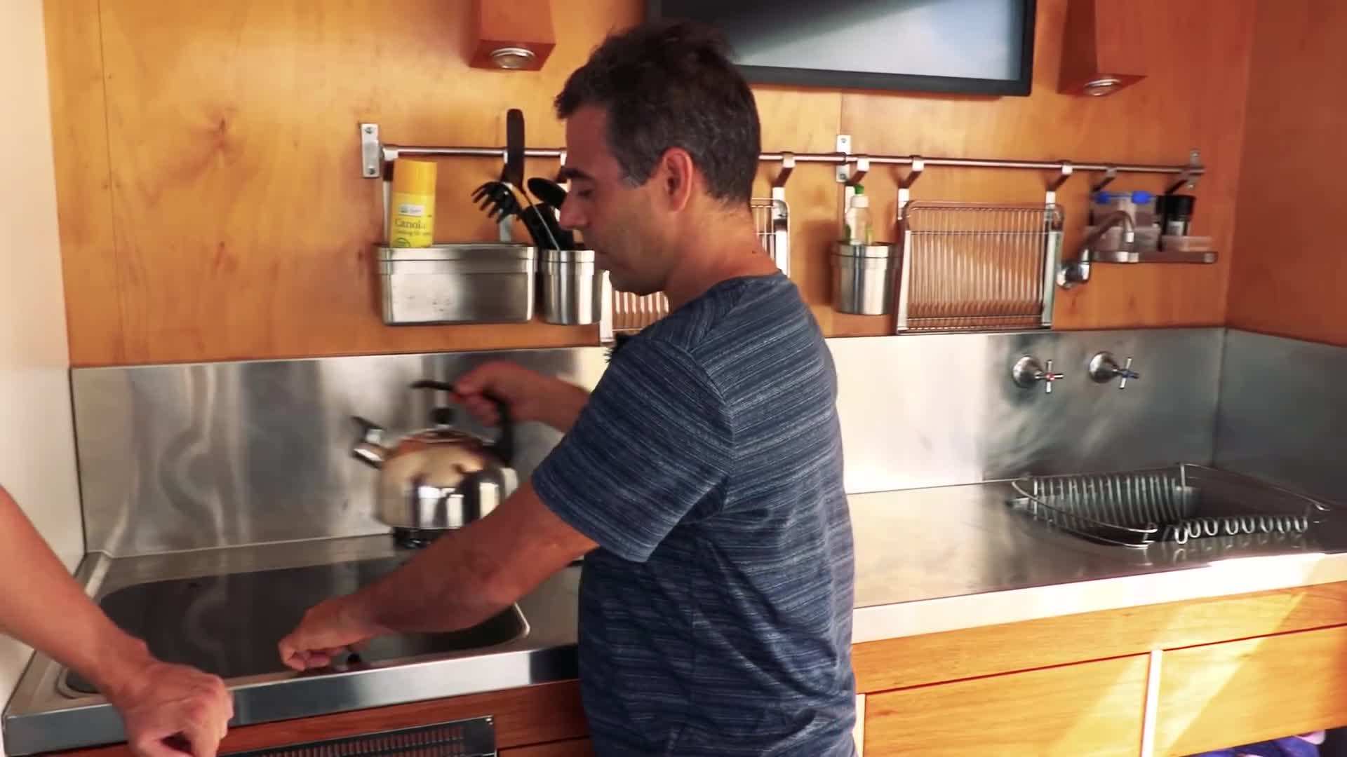 Solar panels on the roof provide sustainable energy for the floating home