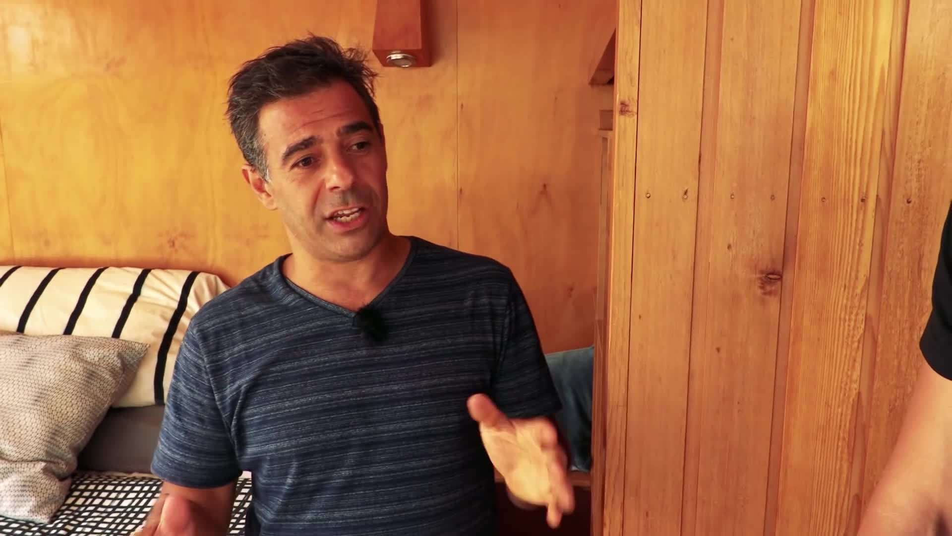 Large windows providing abundant natural light and scenic water views