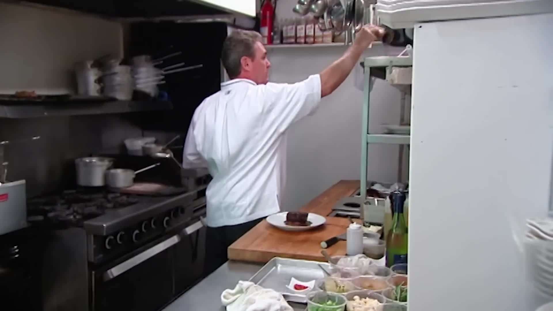 A chef checking inventory to prevent stockouts