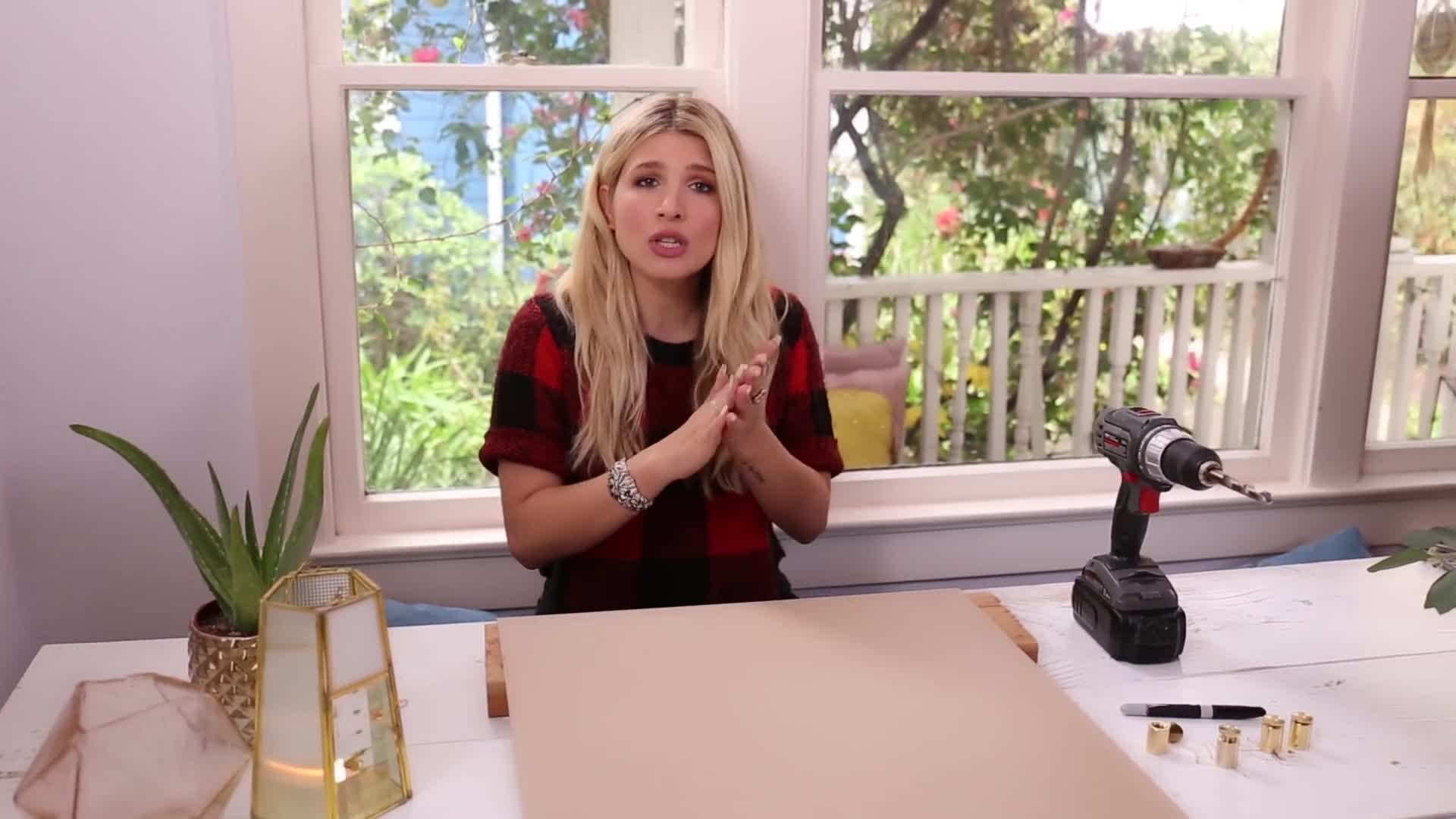 Applying adhesive vinyl to the acrylic sheet