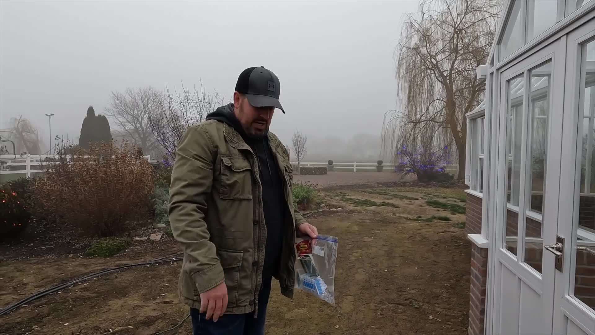 Adding Festive Garland to the Greenhouse