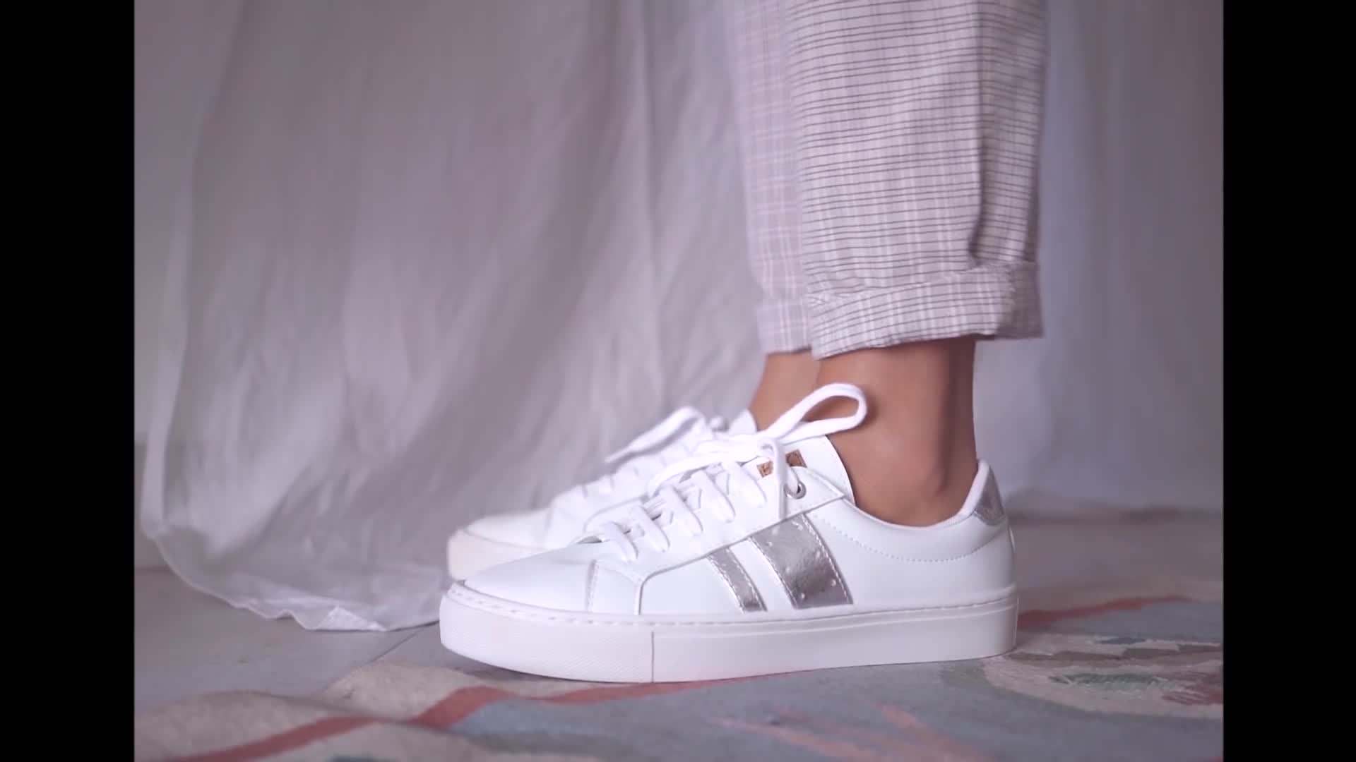 Pairing vegan sneakers with a flowy skirt