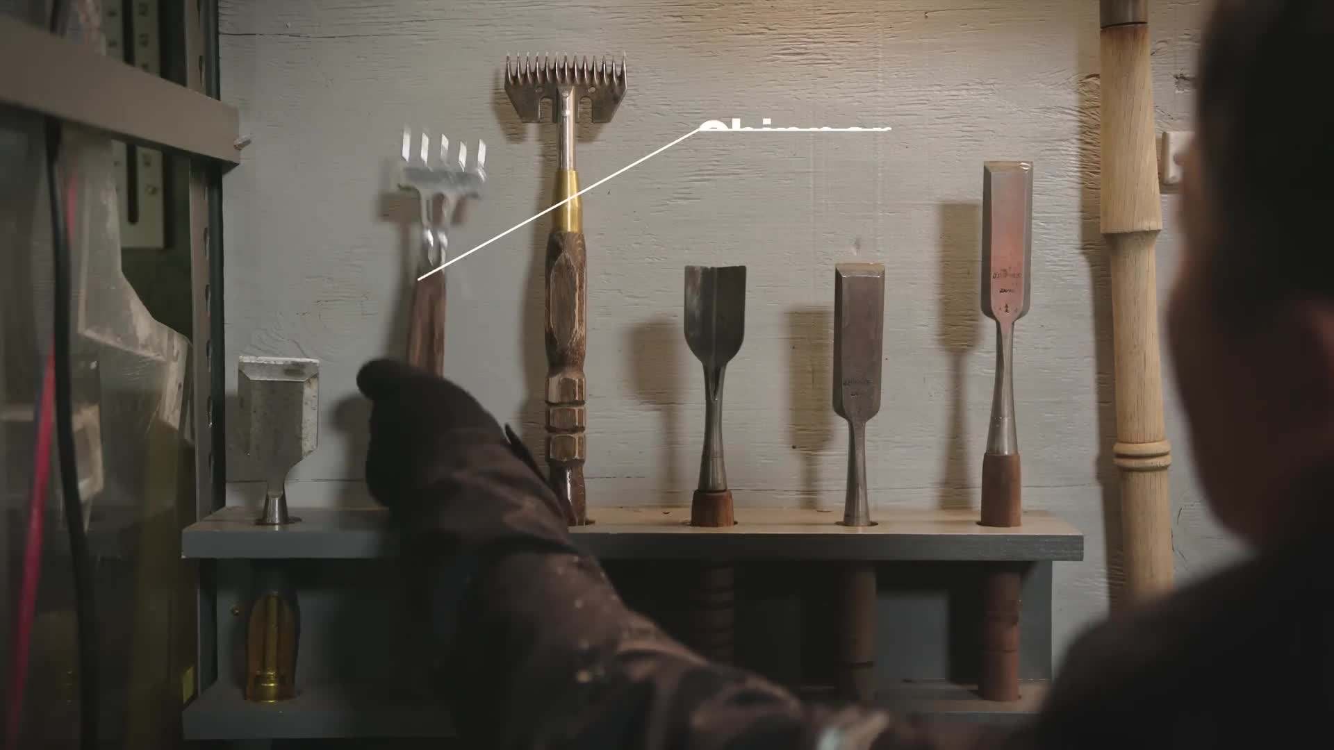 Okamoto using a blowtorch to create texture on the ice