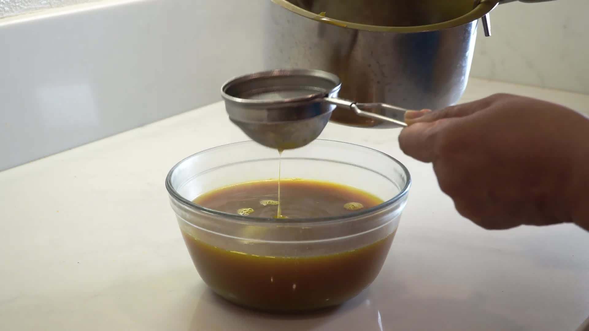 Simmering turmeric and ginger mixture