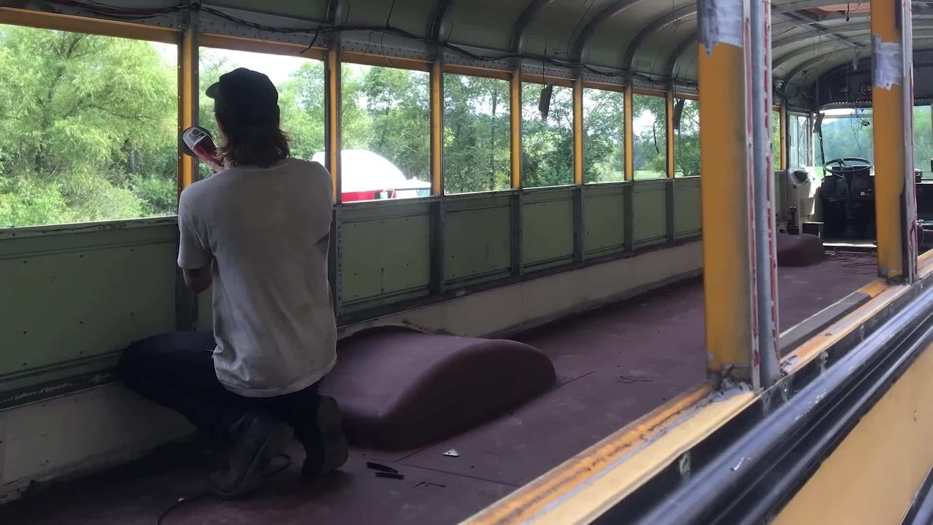 Interior view of the bus showcasing the clever storage solutions and natural light