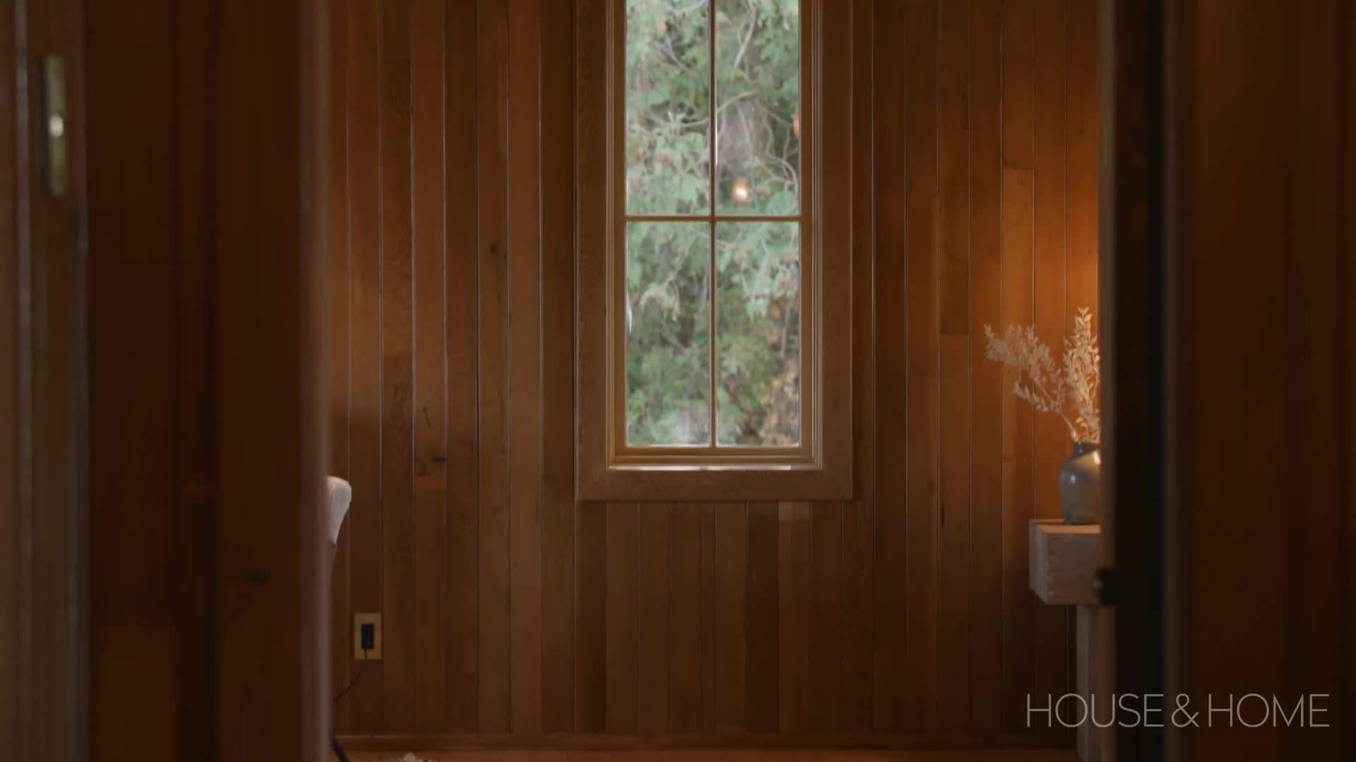 Gallery wall displaying family photos and mementos