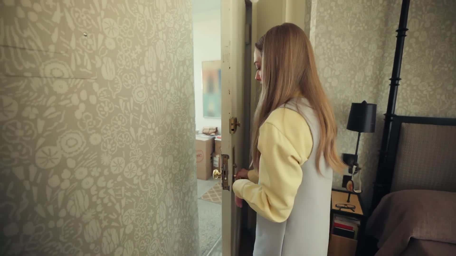 Extensive book collection showcasing Seyfried's love for literature