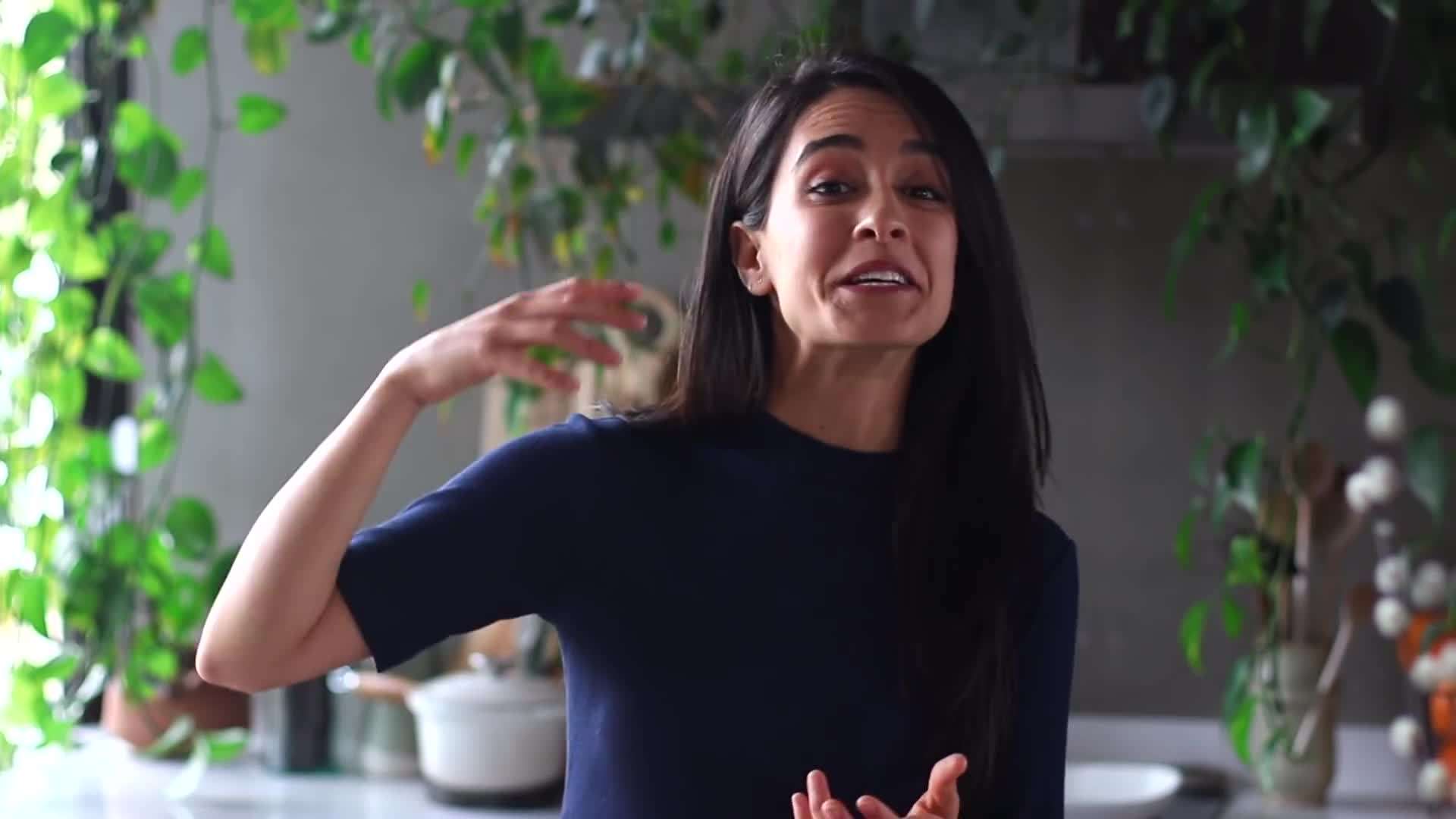 Drizzling dressing over a salad