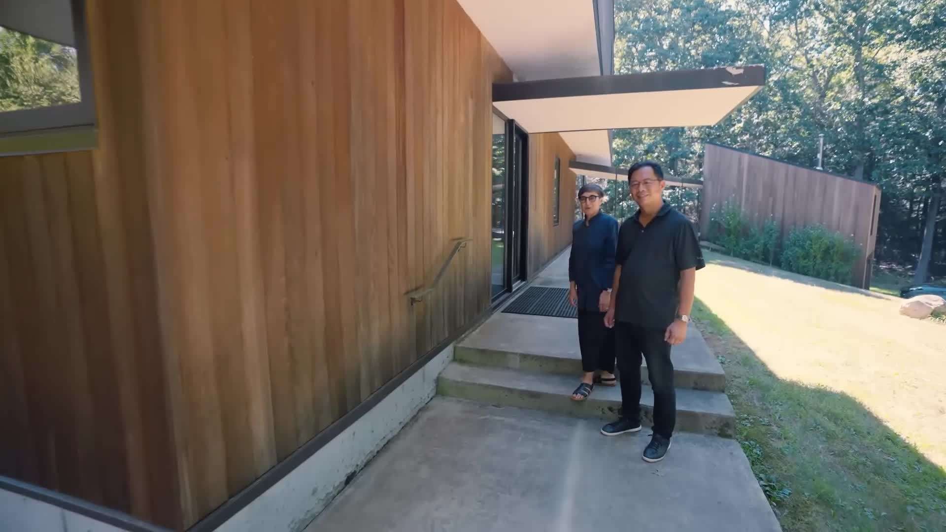 Exterior view of the floating house in the woods