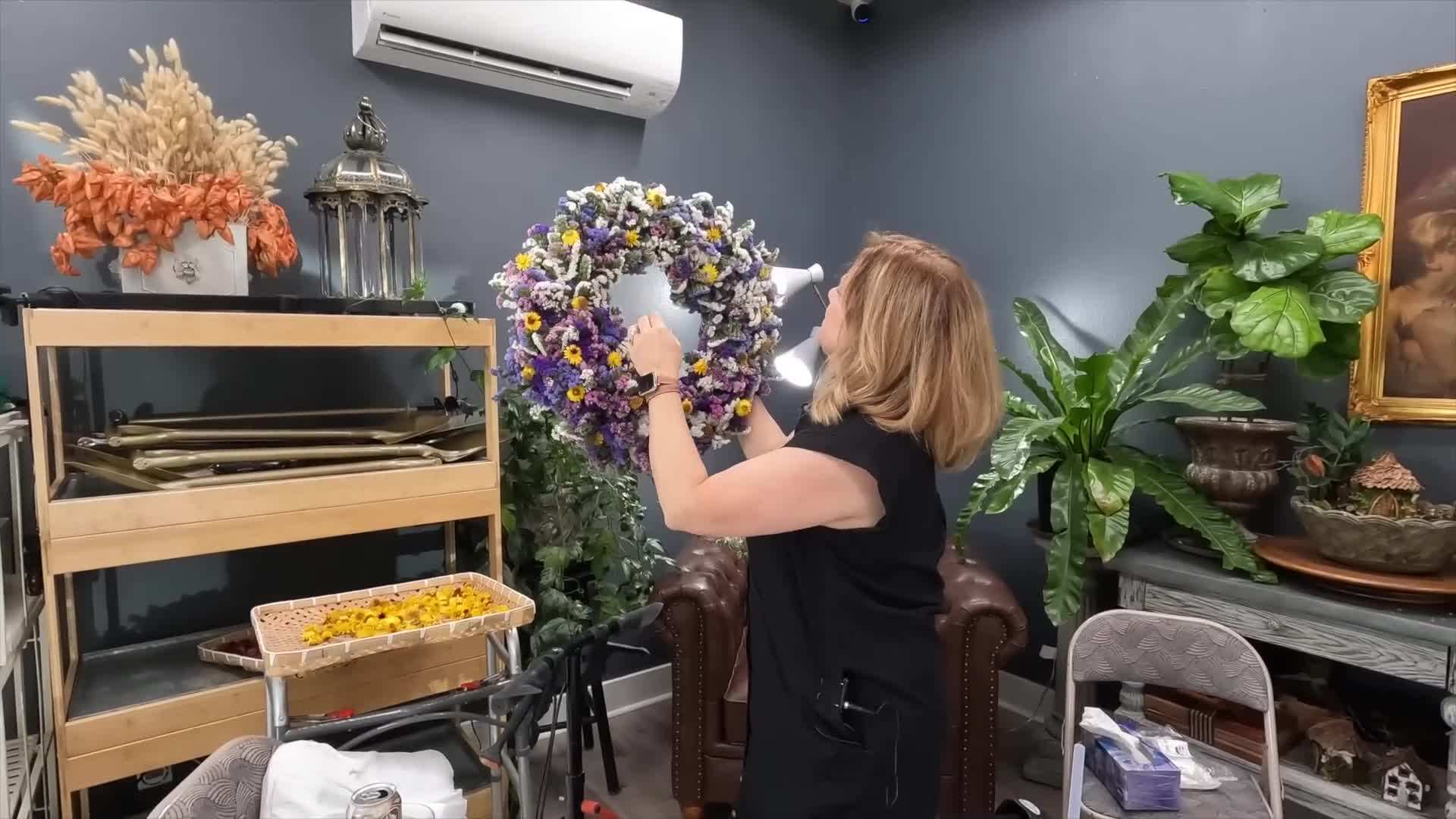 Tie a ribbon around the wreath frame for an elegant touch