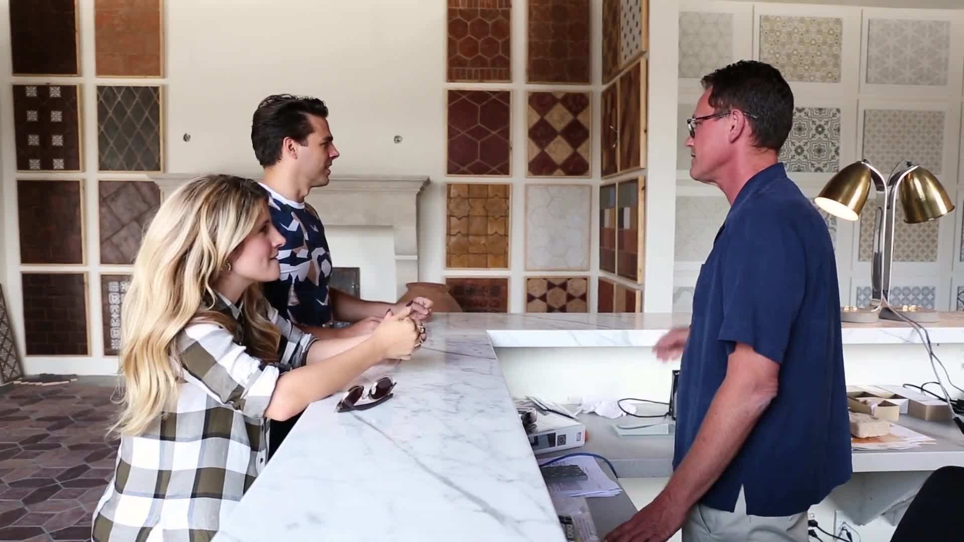 Mosaic tiles in various colors and shapes on a kitchen backsplash