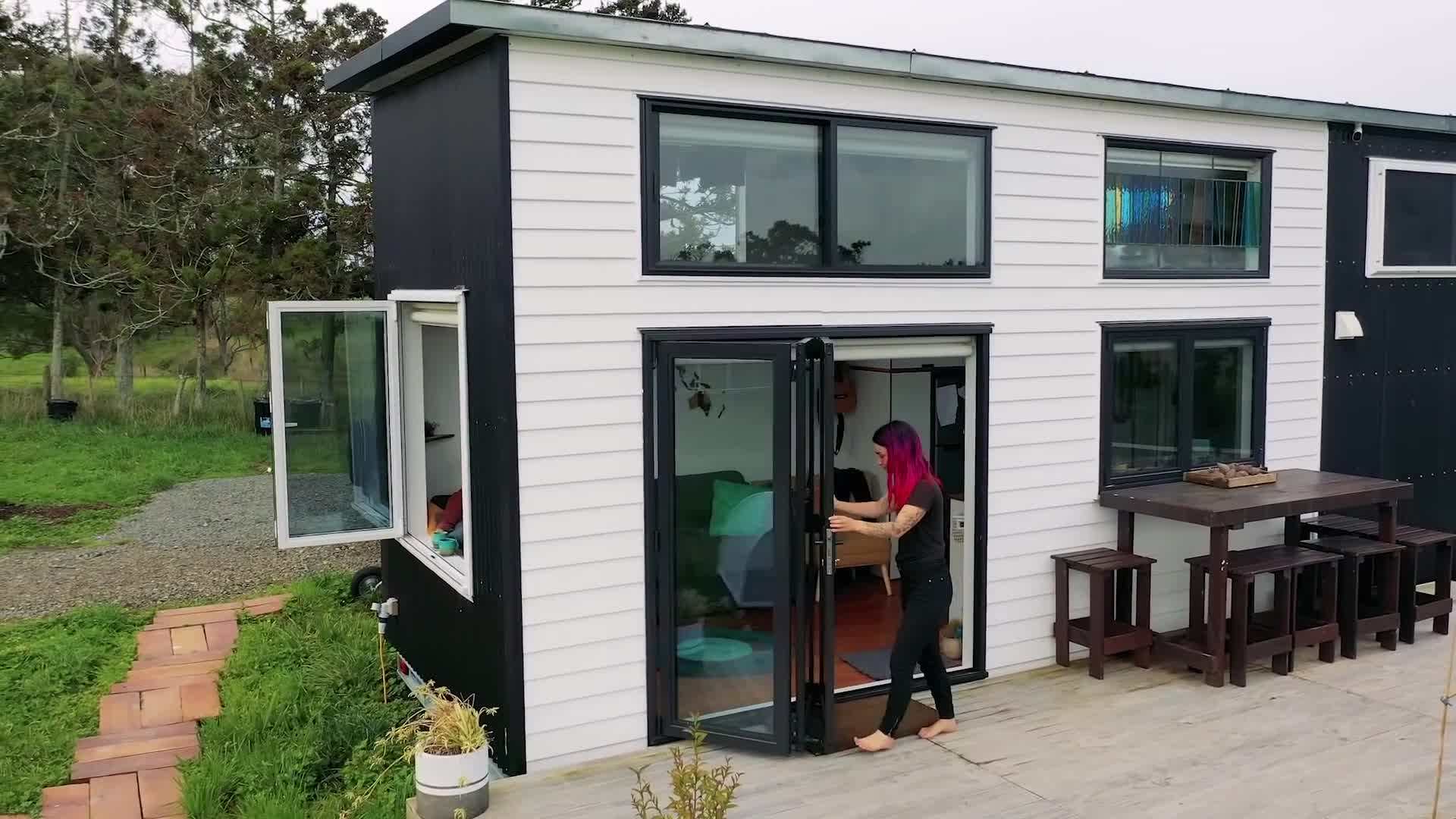 Retractable staircase and storage in tiny house design
