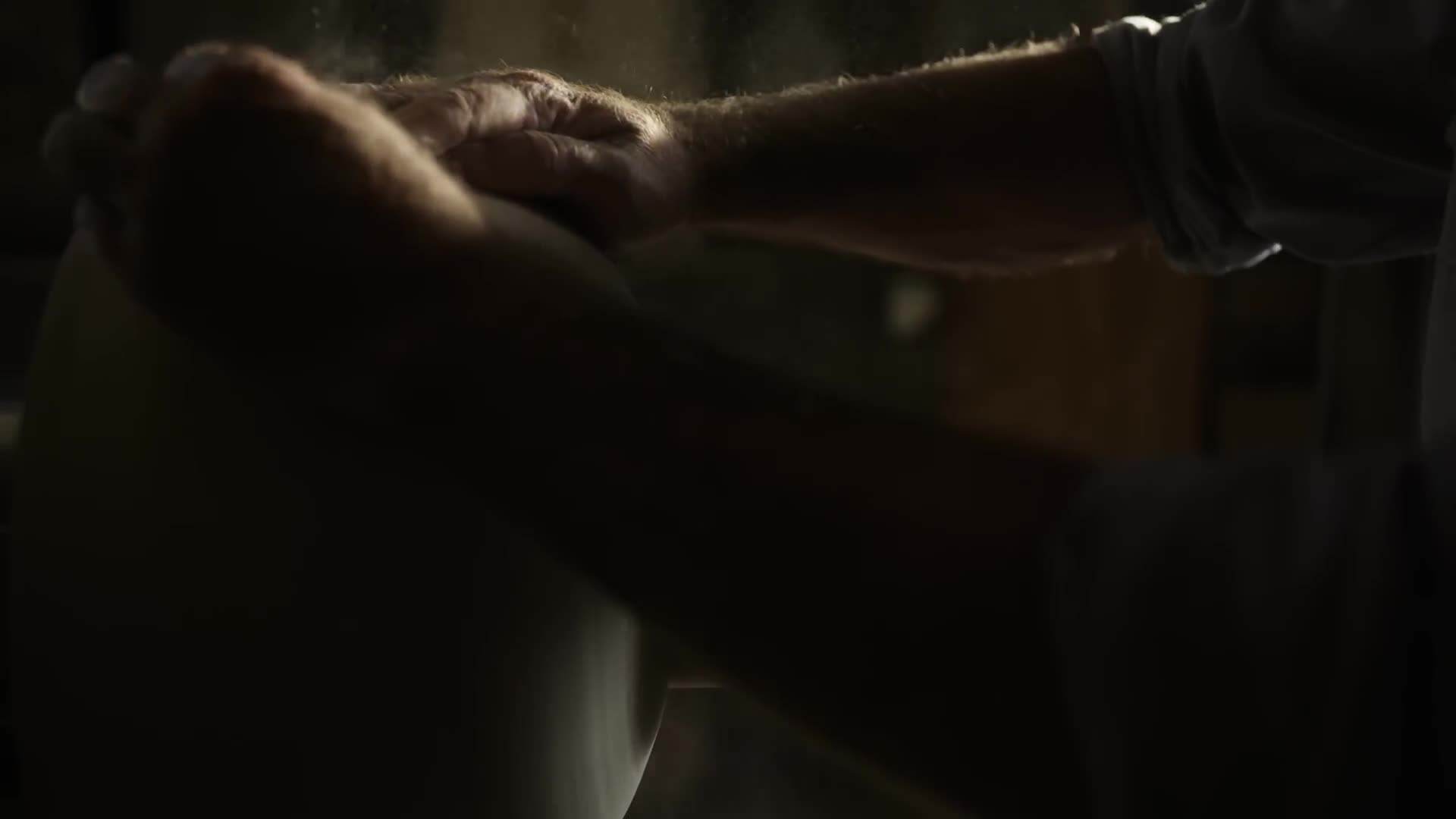 Applying the finishing touches to the vase