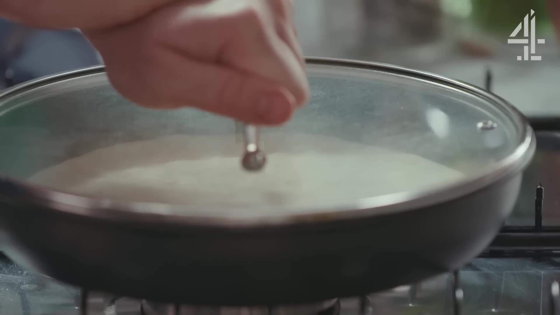 Topping the pizza with passata and cheese