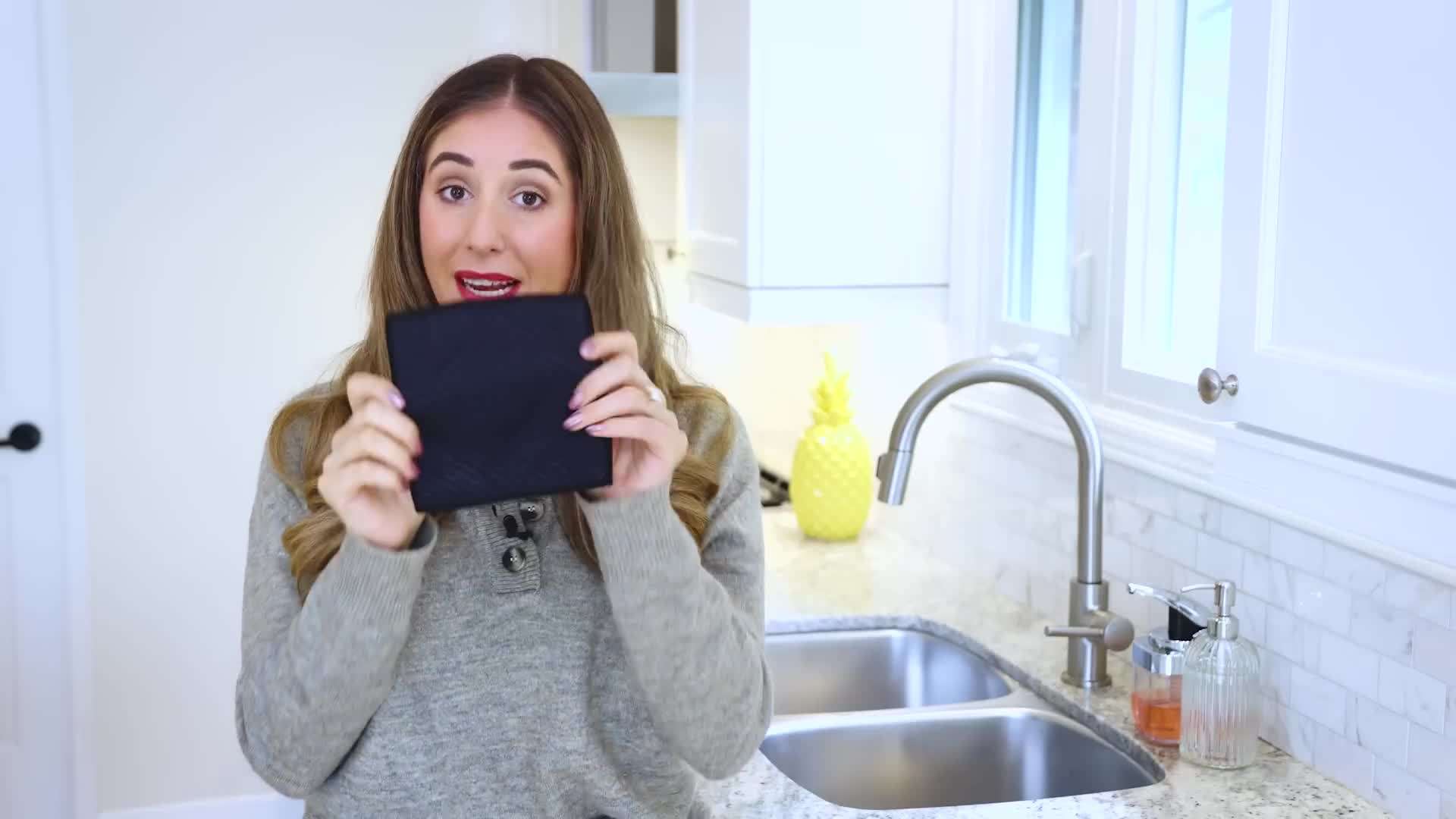 Scrub Square in action - cleaning a dirty kitchen countertop