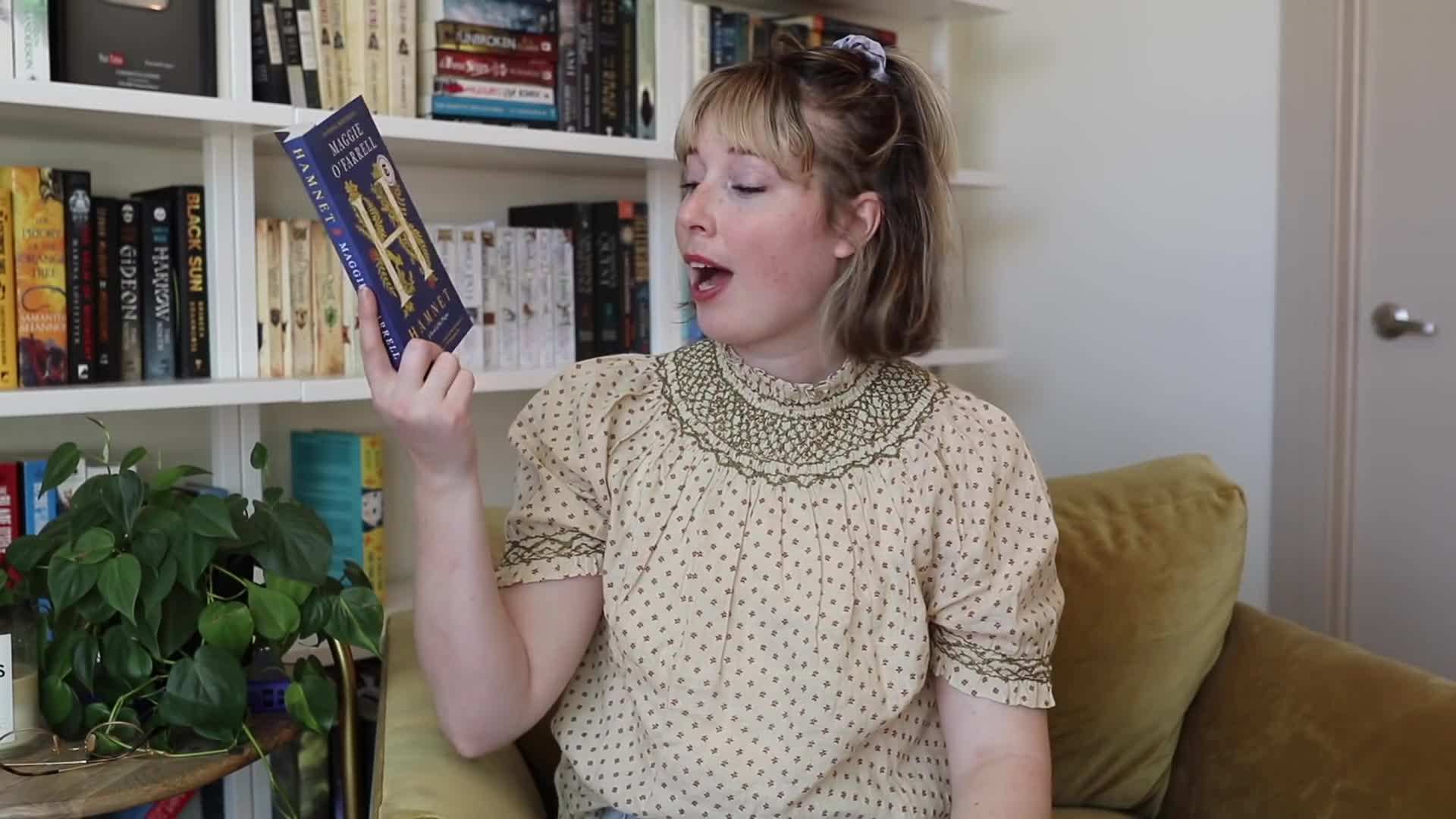 Close-up of a section of my bookshelf filled with unread books