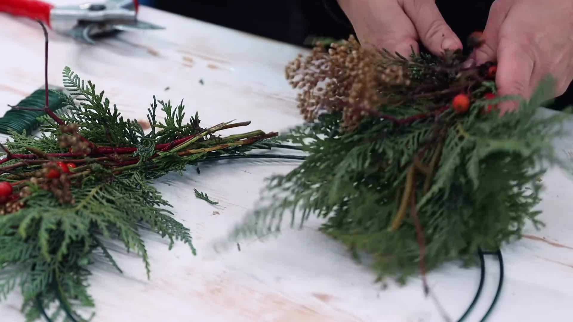Attaching materials to a grapevine wreath