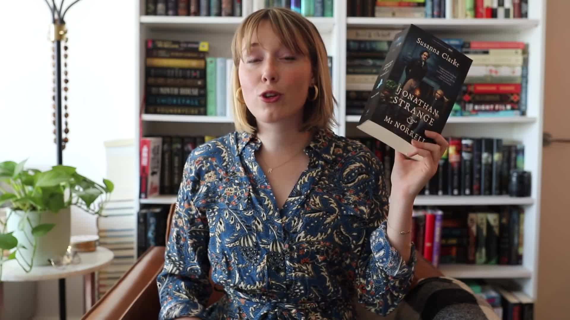 A happy reader receiving a donated book